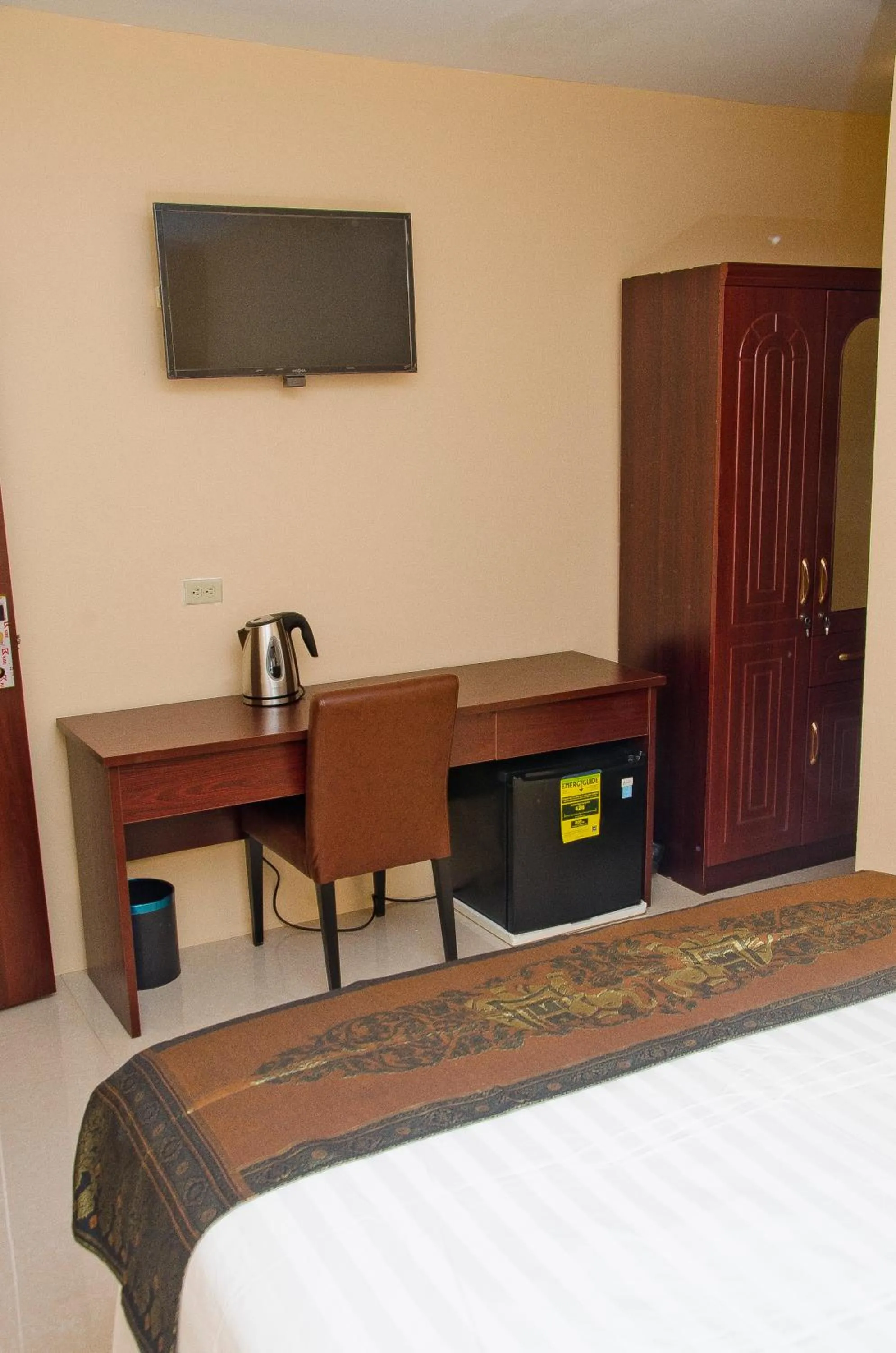 Bed in Grand Diamond Hotel Trinidad