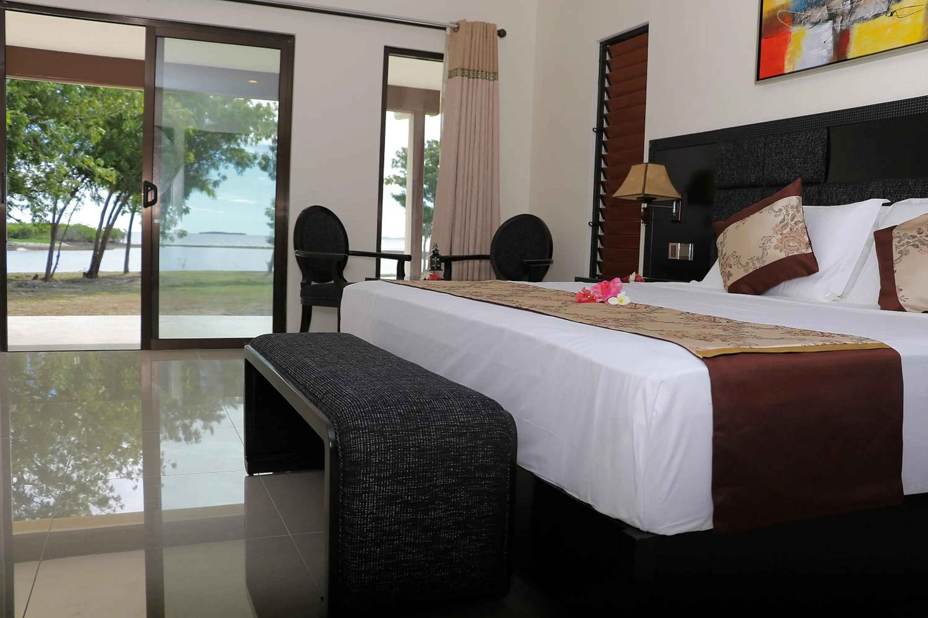 Photo of the whole room, Bed in Parkside Nila Beach Resort