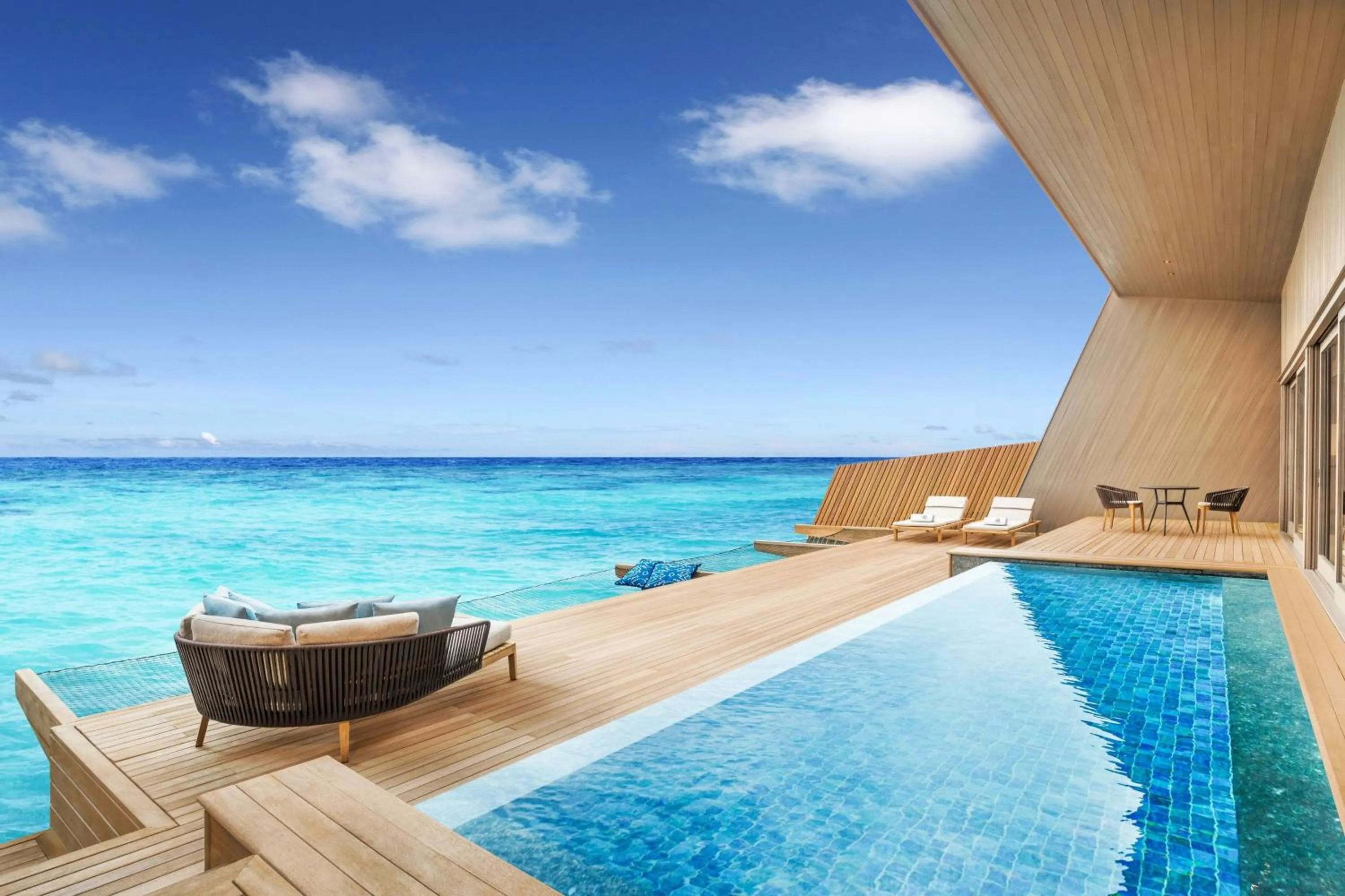 Swimming pool in The St. Regis Maldives Vommuli Resort