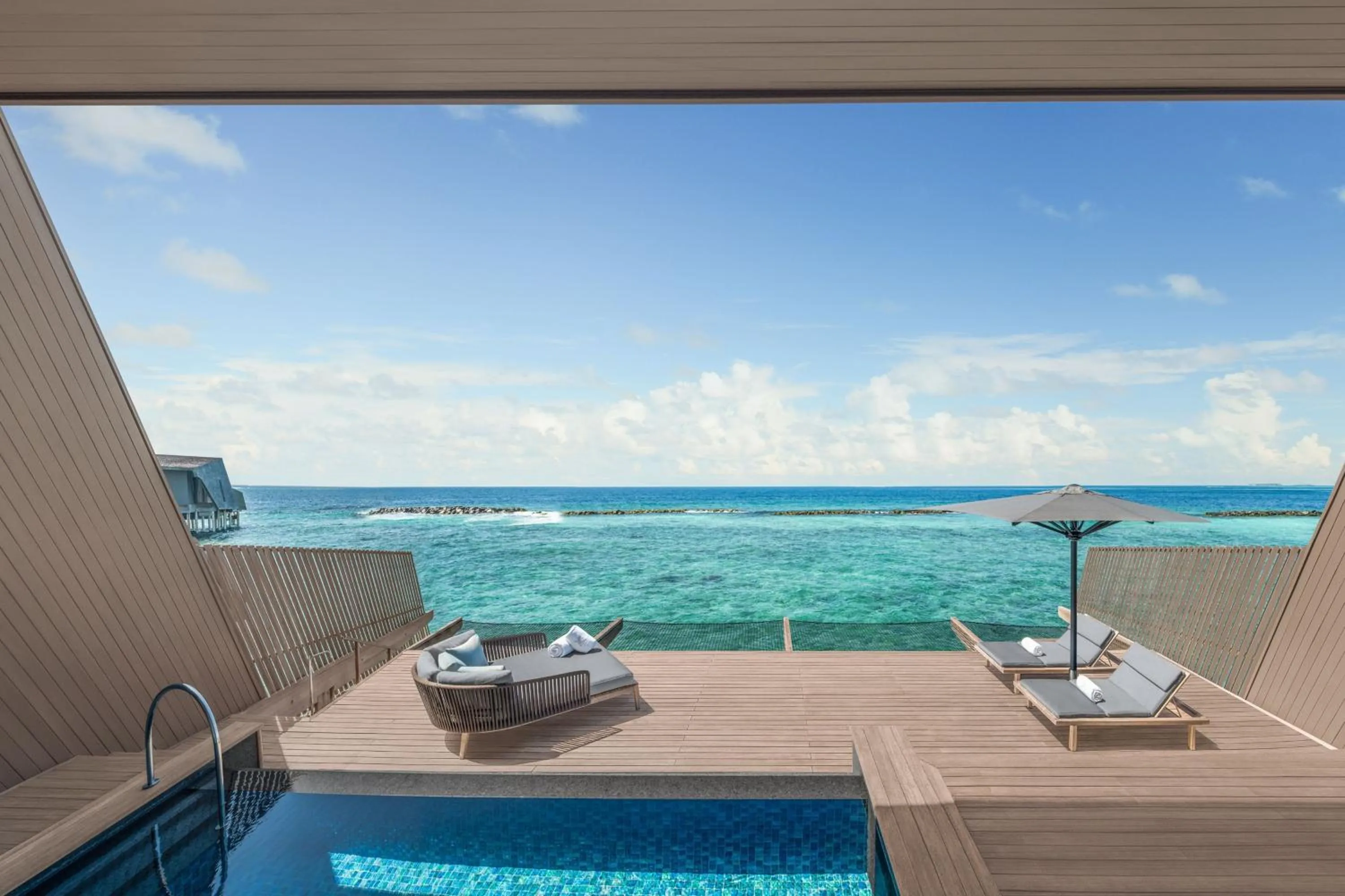 Swimming pool in The St. Regis Maldives Vommuli Resort