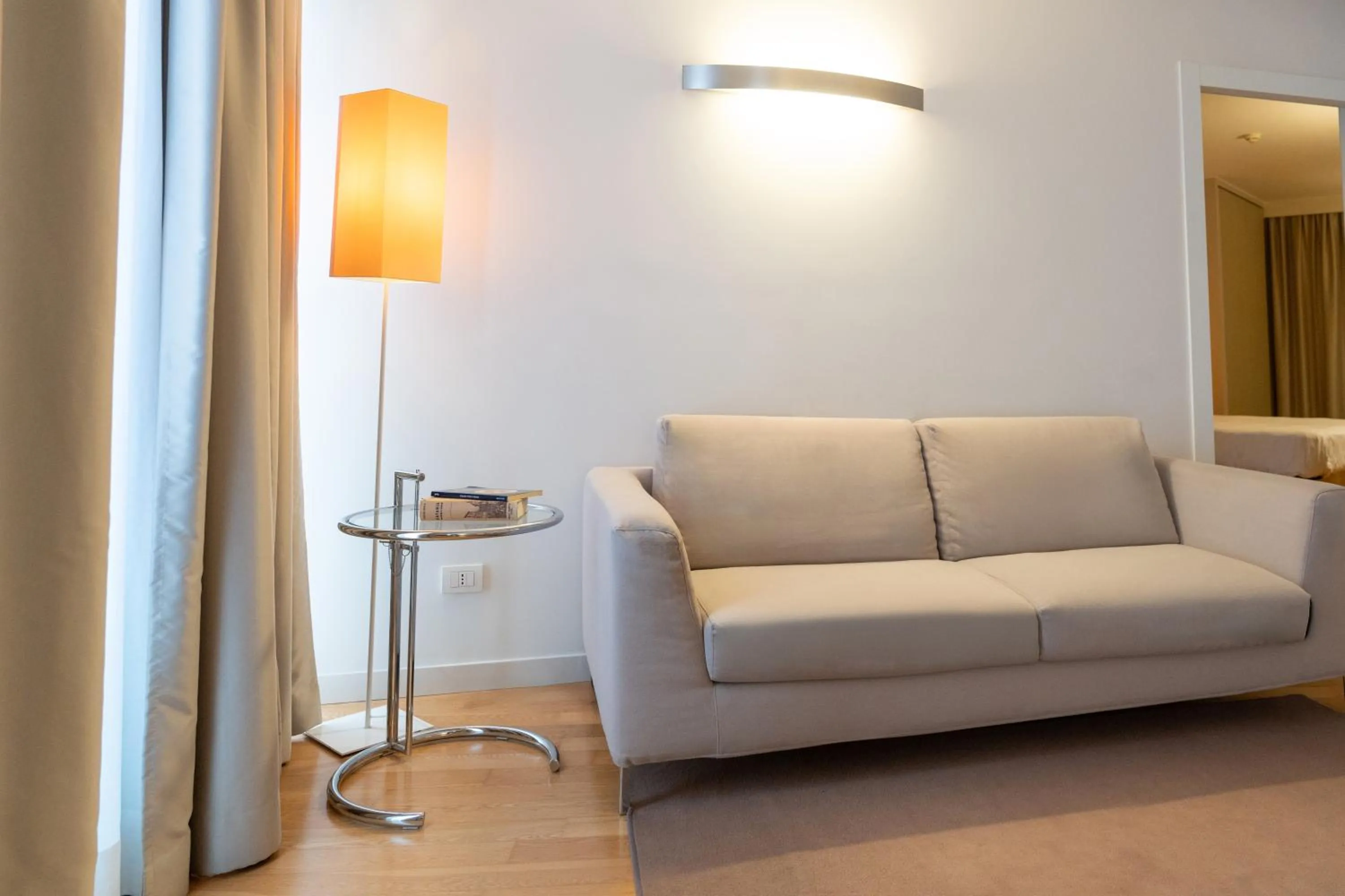 Seating area in Home 15 Residence Hotel