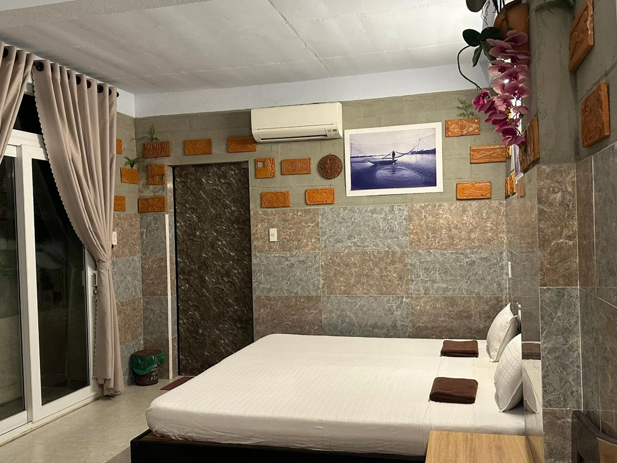 Deluxe Room (2 Adults + 1 Child) - single occupancy in Terra Cotta Homestay