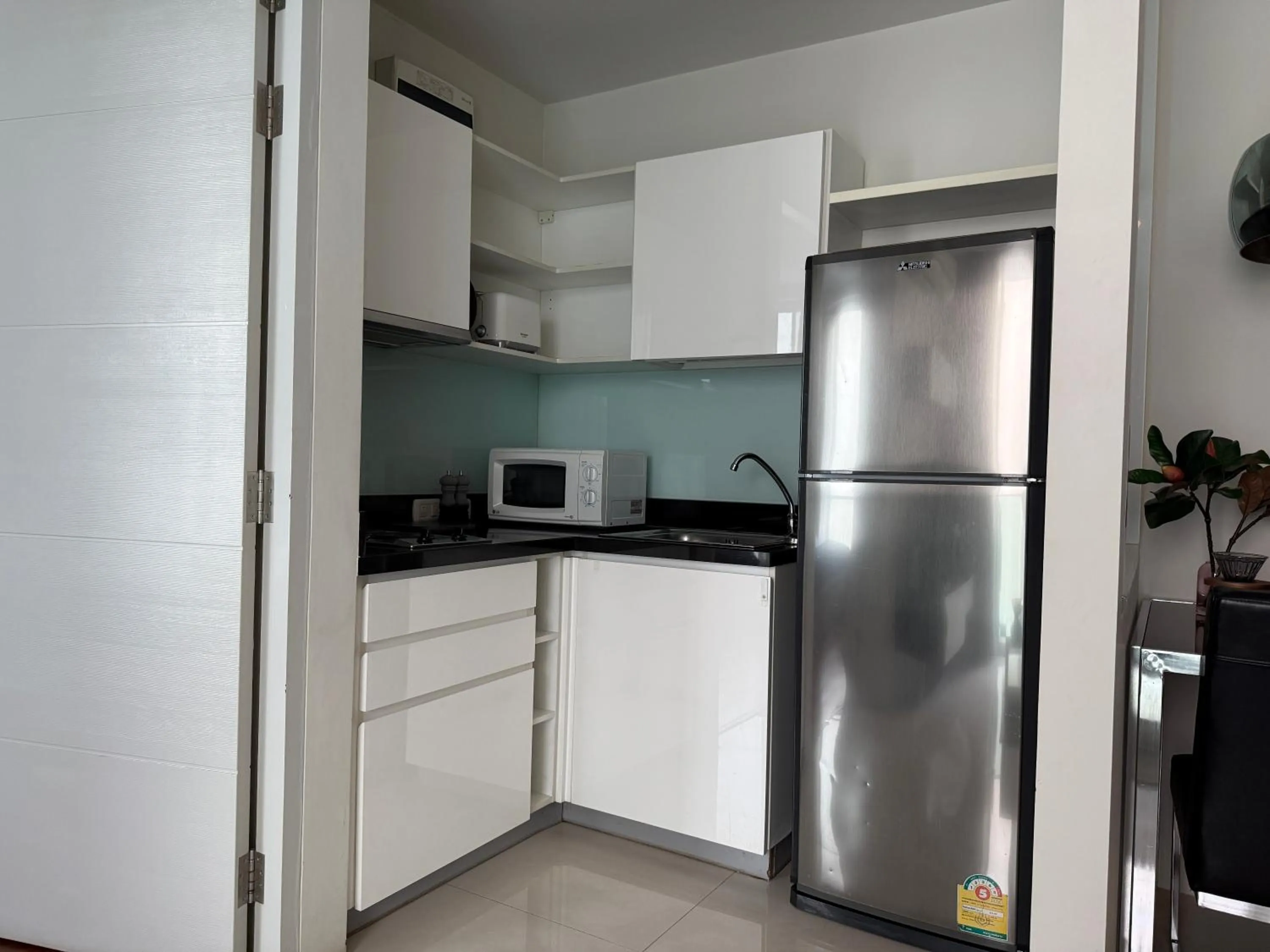 Kitchen or kitchenette in Aspira G Sukhumvit 33
