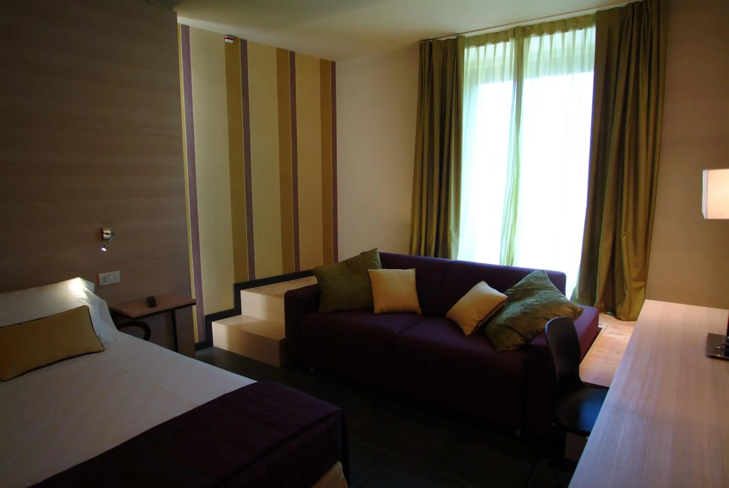 Superior Quadruple Room in El Homs Palace Hotel Superior Quadruple Room in El Homs Palace Hotel