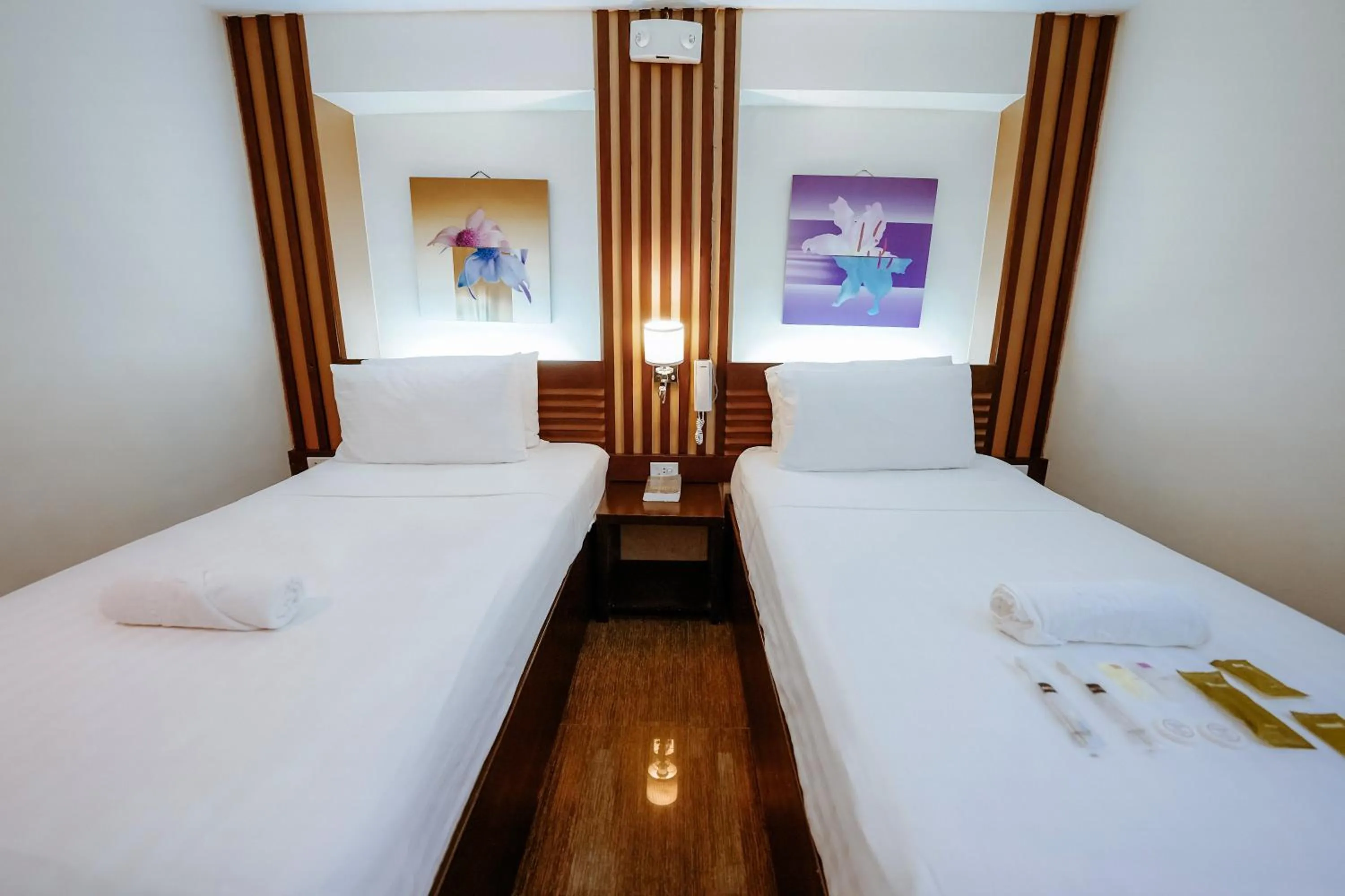 Bed in Emerald Boutique Hotel