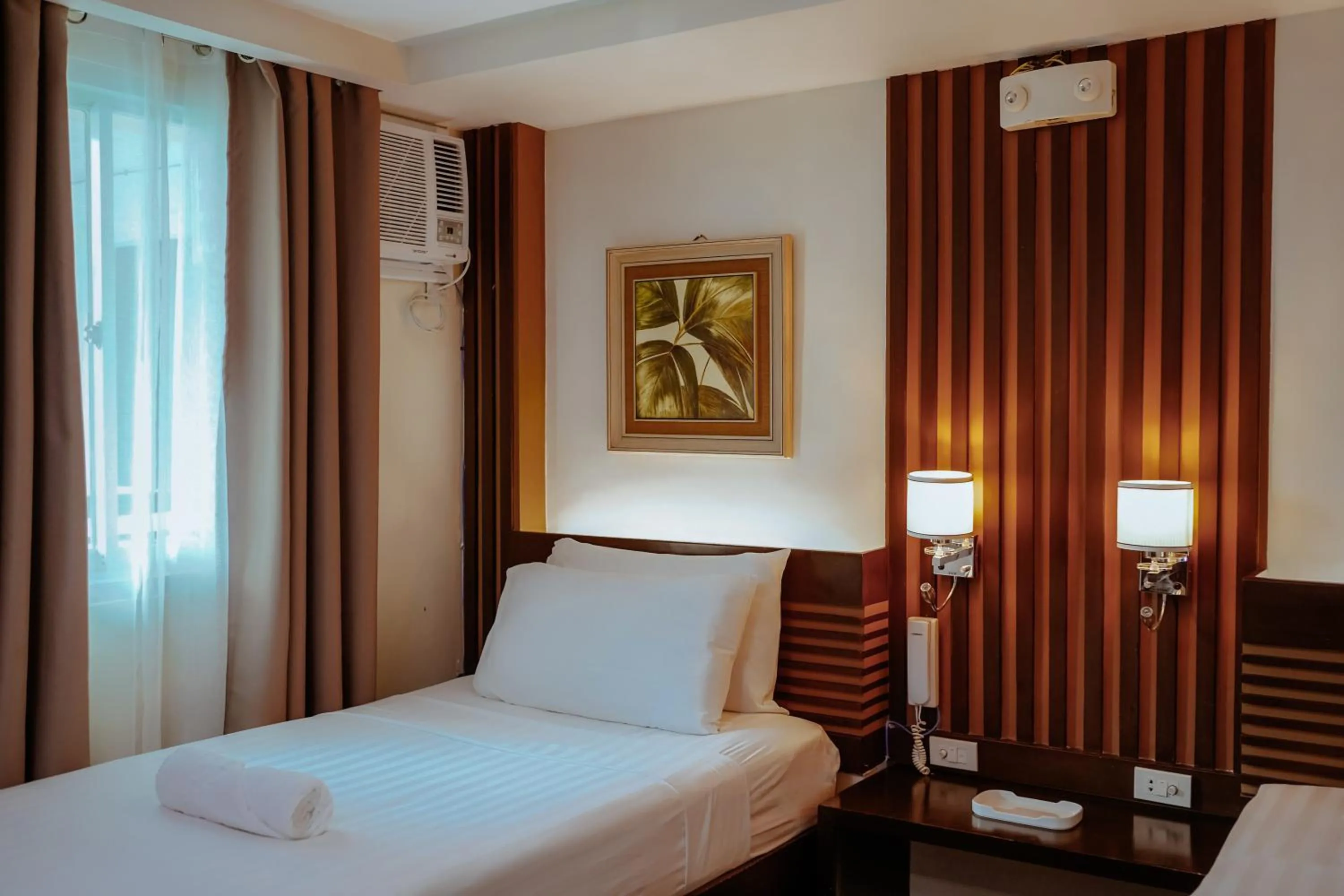 Bedroom in Emerald Boutique Hotel