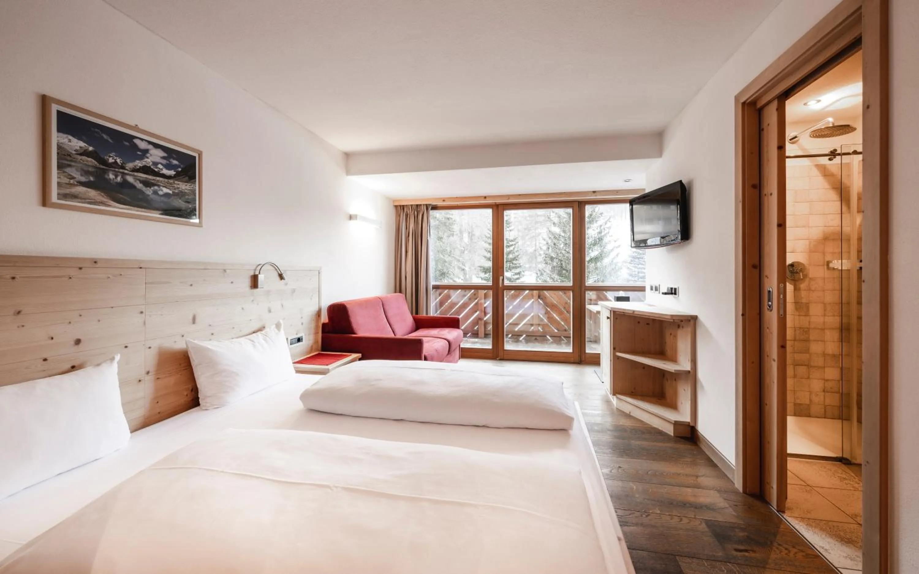 Bed in Hotel Ladinia