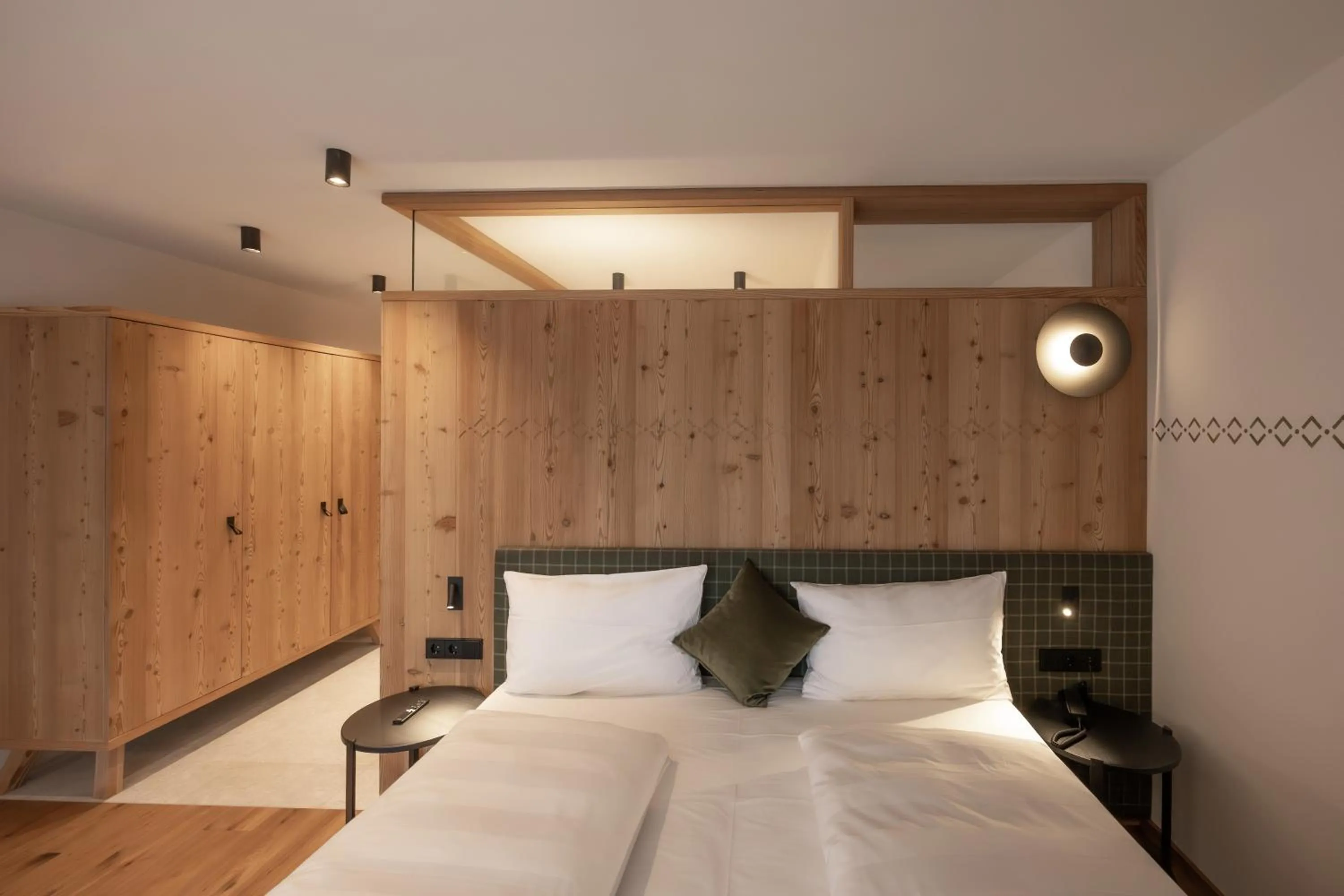 Bed in Hotel Ladinia