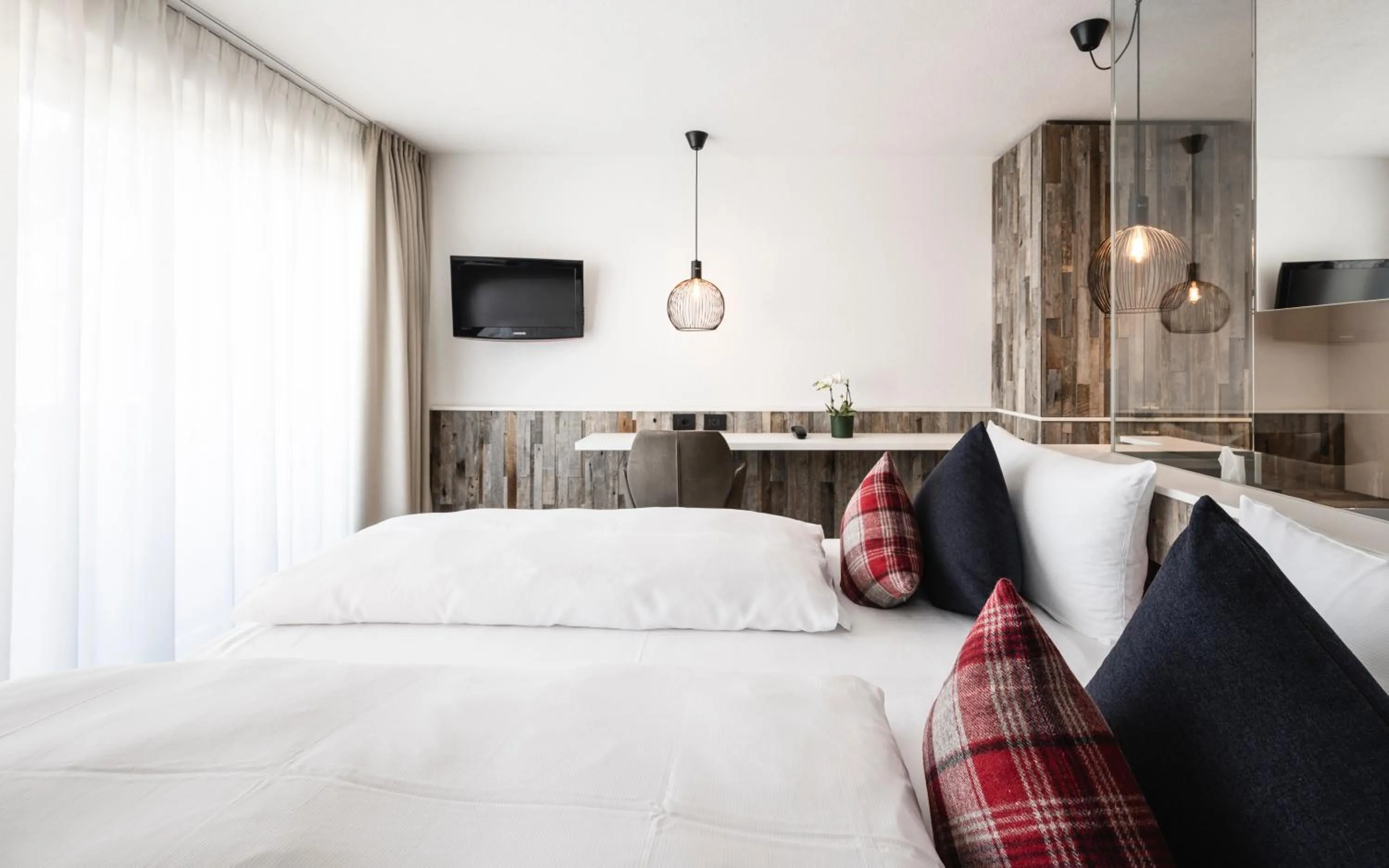 Bed in Hotel Ladinia