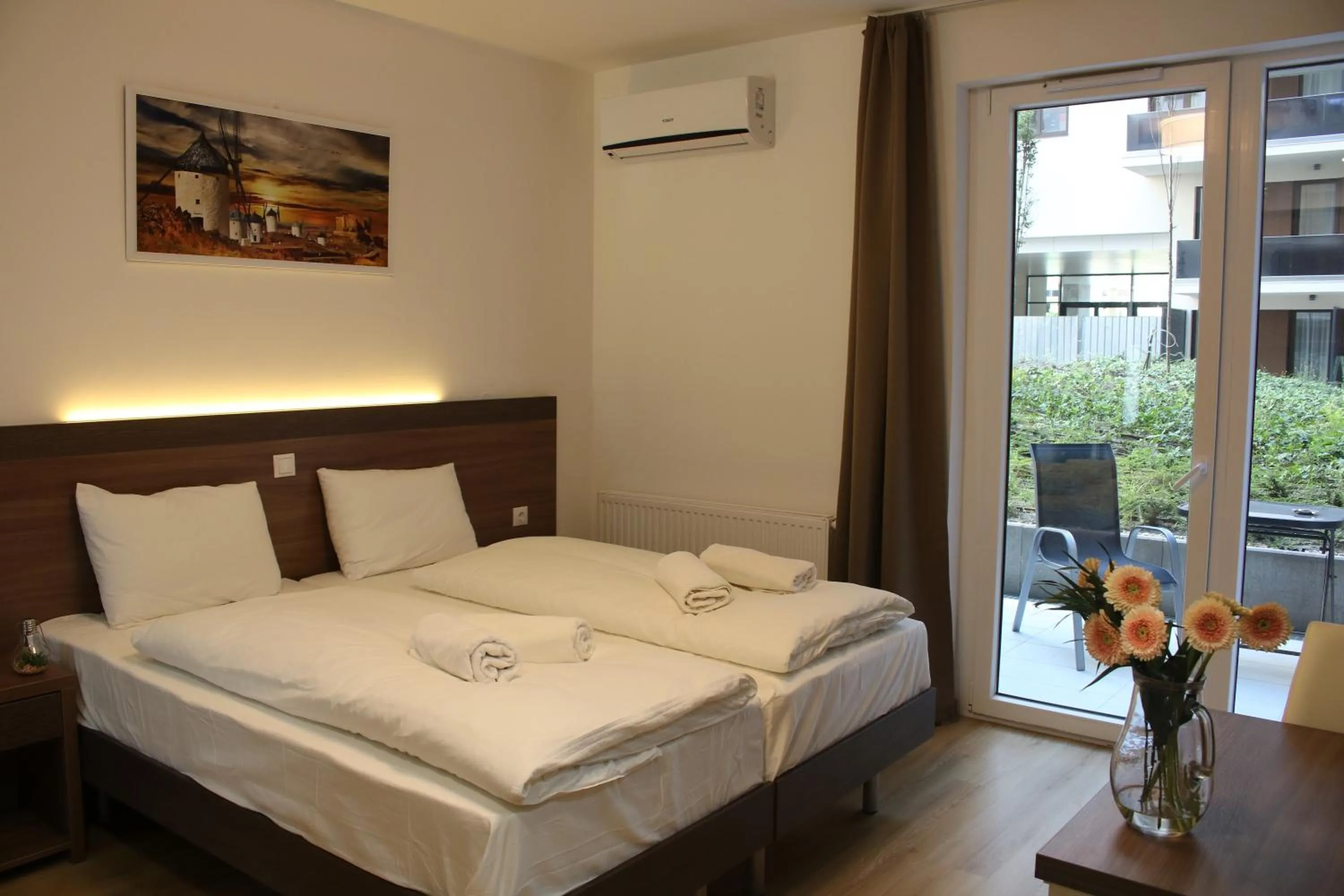 Bed in Corvin holiday Apartments hotel