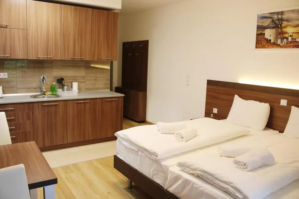 Bed in Corvin holiday Apartments hotel