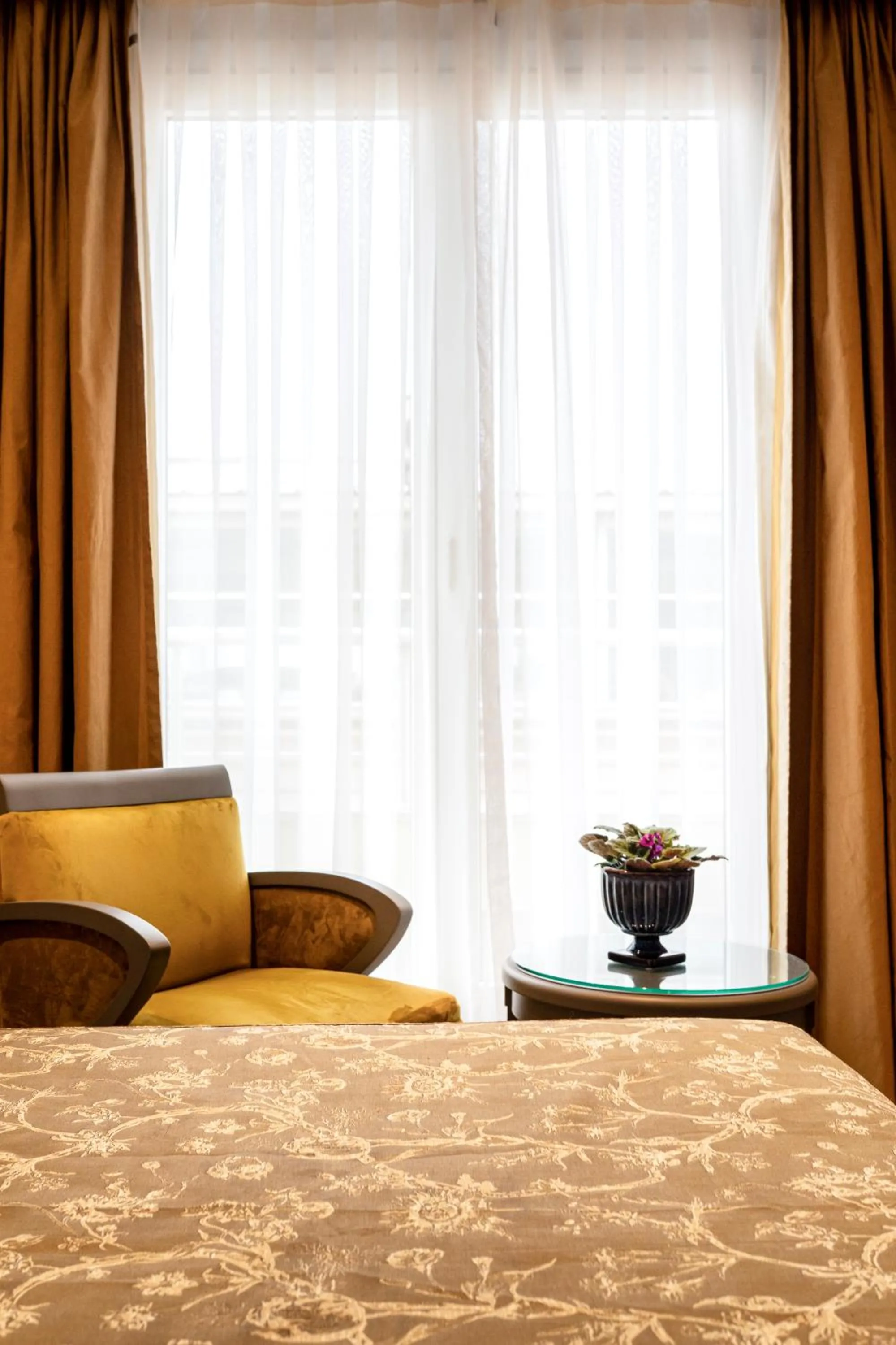 Seating area, Bed in Oran Hotel