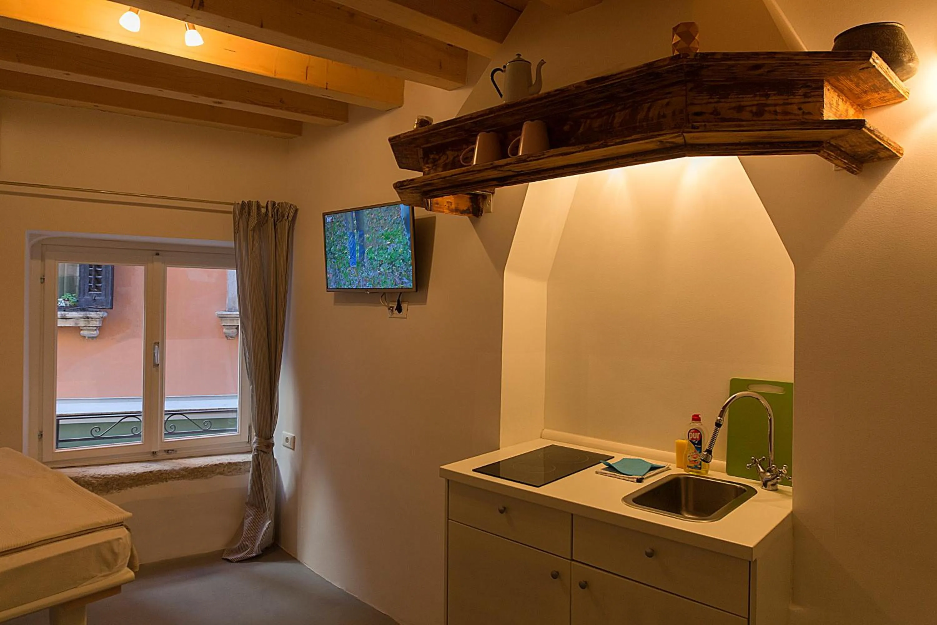 Kitchen or kitchenette in Apartments Casa Vecchia
