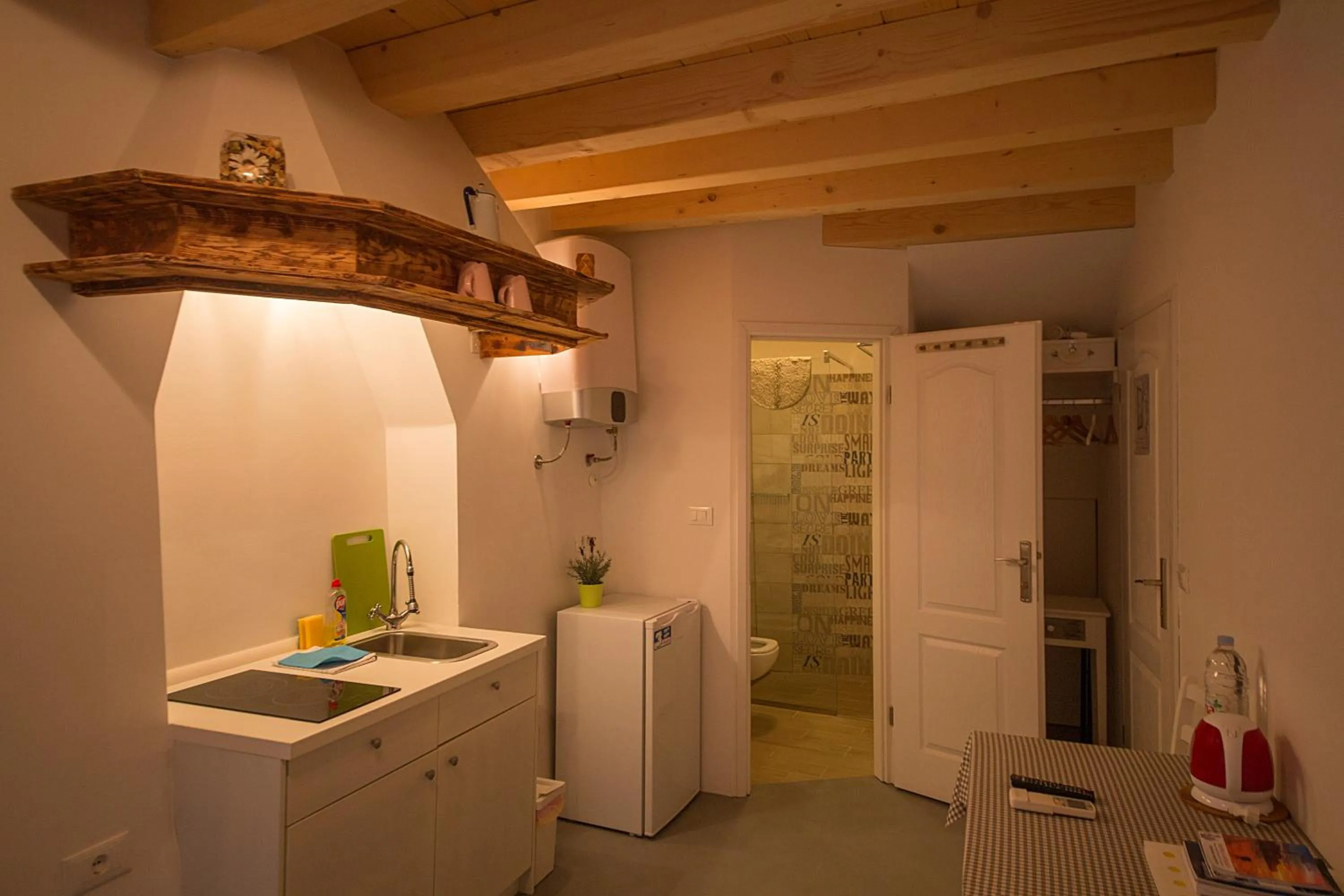 Kitchen or kitchenette in Apartments Casa Vecchia