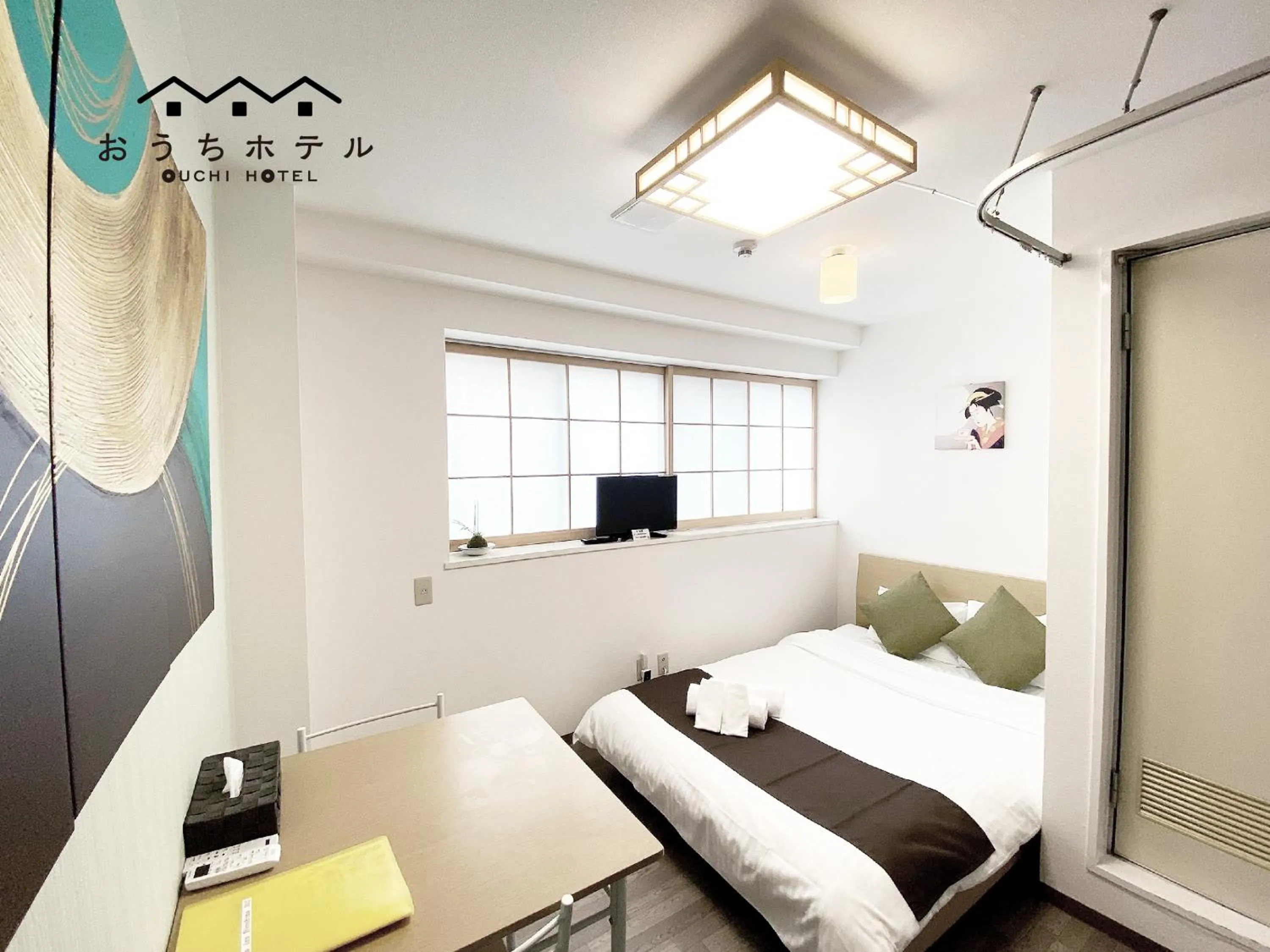 Bed in OUCHI HOTEL Yokogawa