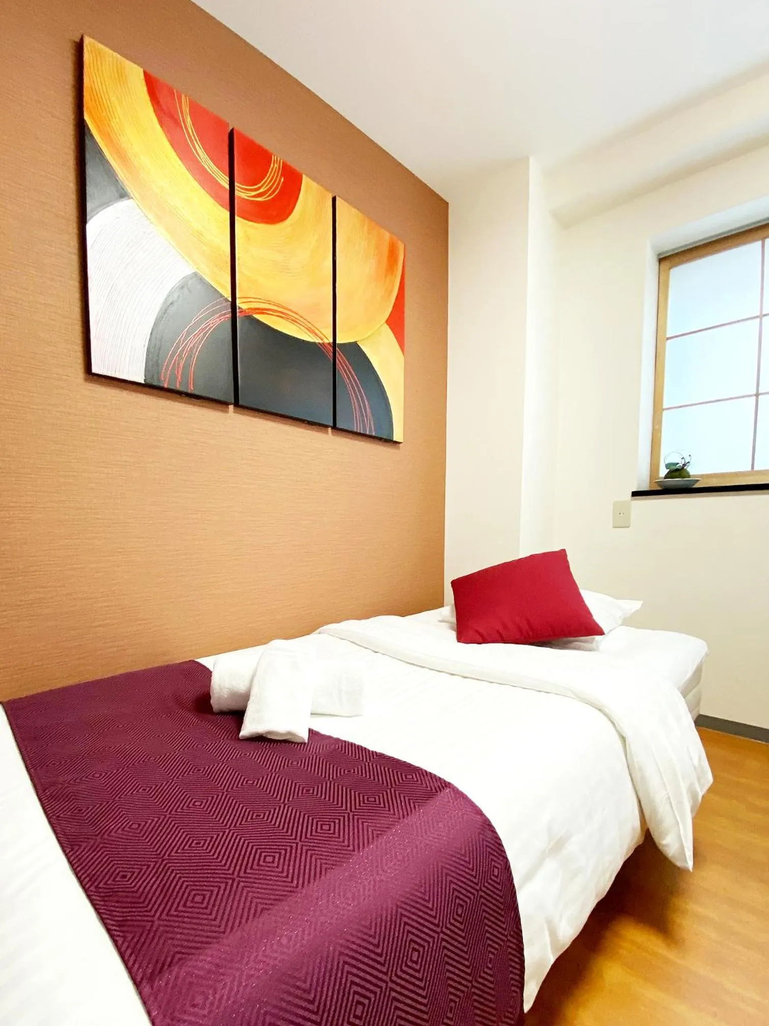 Bed in OUCHI HOTEL Yokogawa