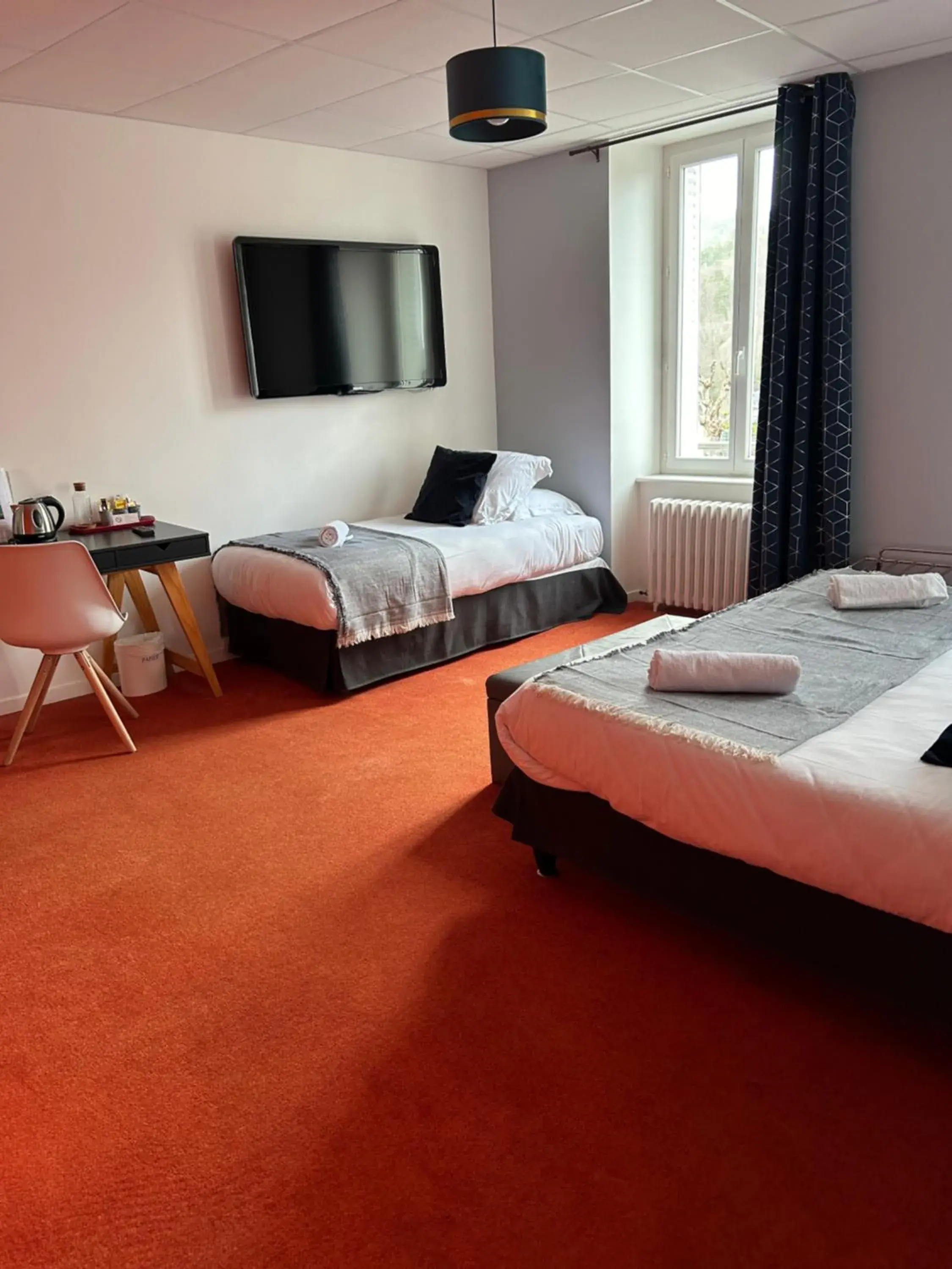 Bed in Logis Hôtel de Paris Bed in Logis Hôtel de Paris