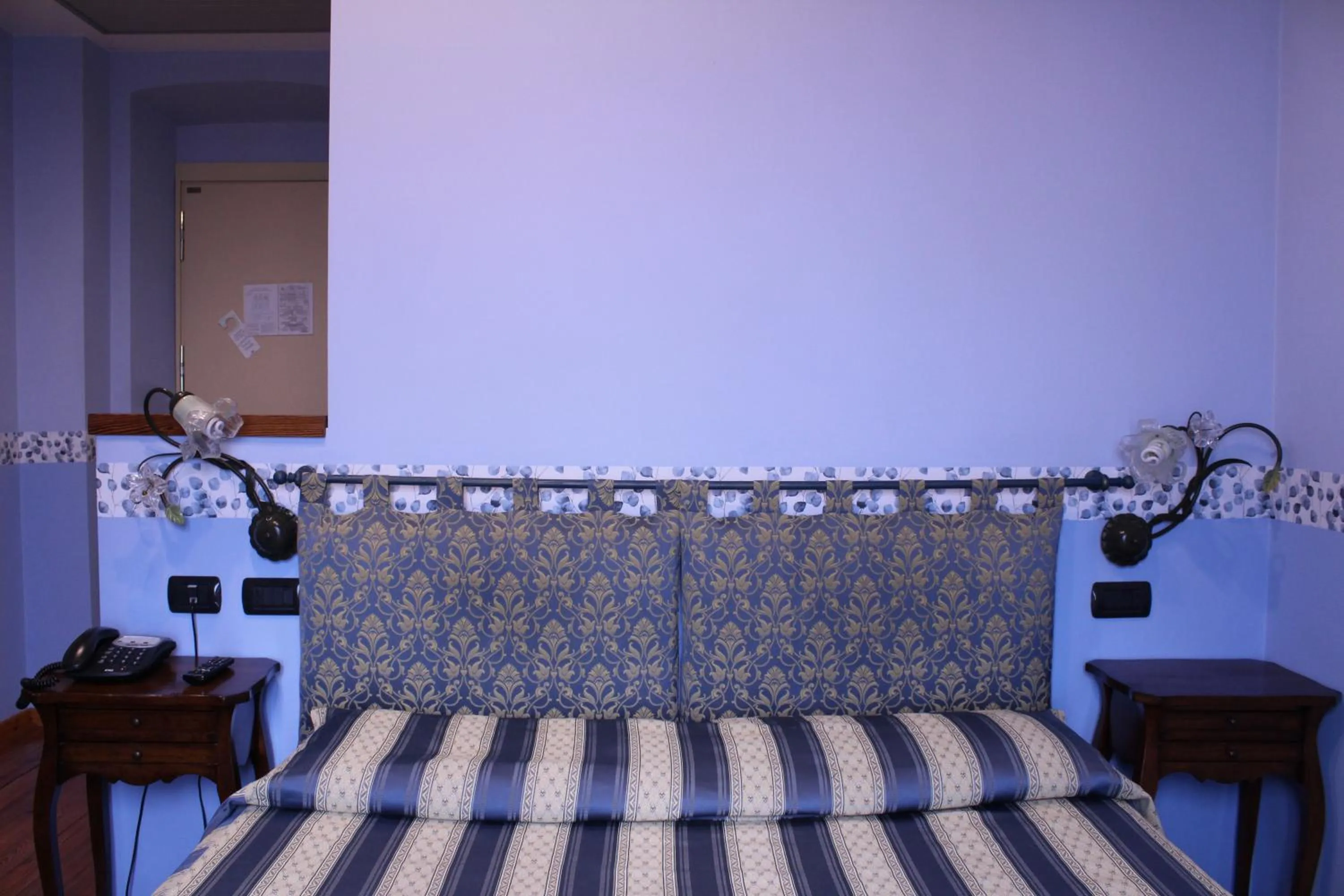 Bed in Hotel Belle Epoque