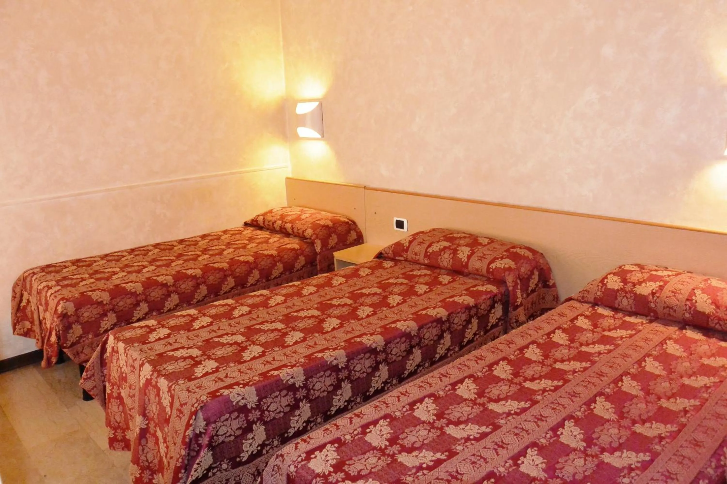 Bed in Hotel Nettuno