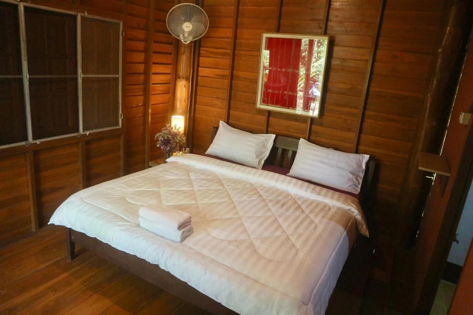 Bed in Maewin Guesthouse and Resort