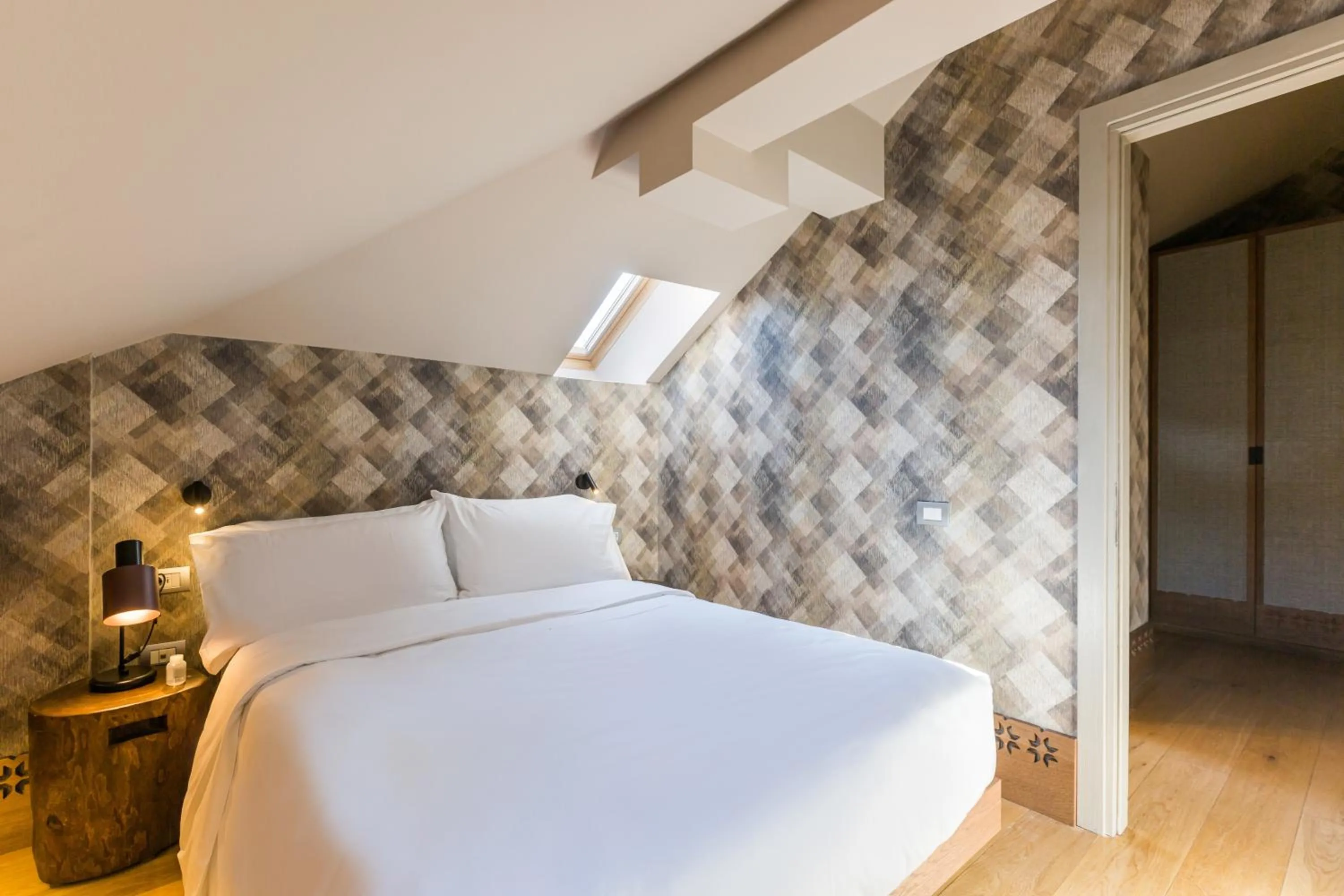 Bedroom, Bed in Grand Hotel Savoia Cortina d'Ampezzo, A Radisson Collection Hotel