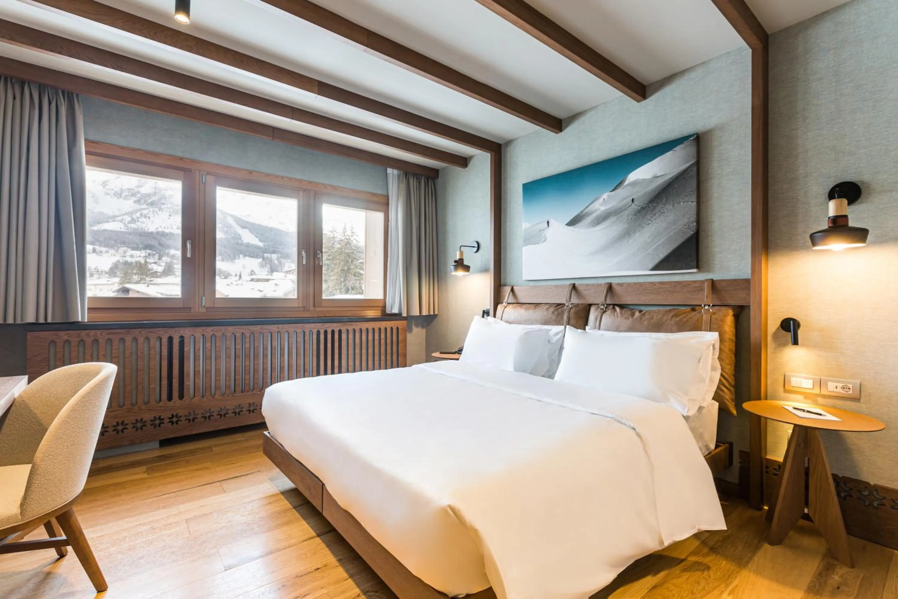 Bed in Grand Hotel Savoia Cortina d'Ampezzo, A Radisson Collection Hotel