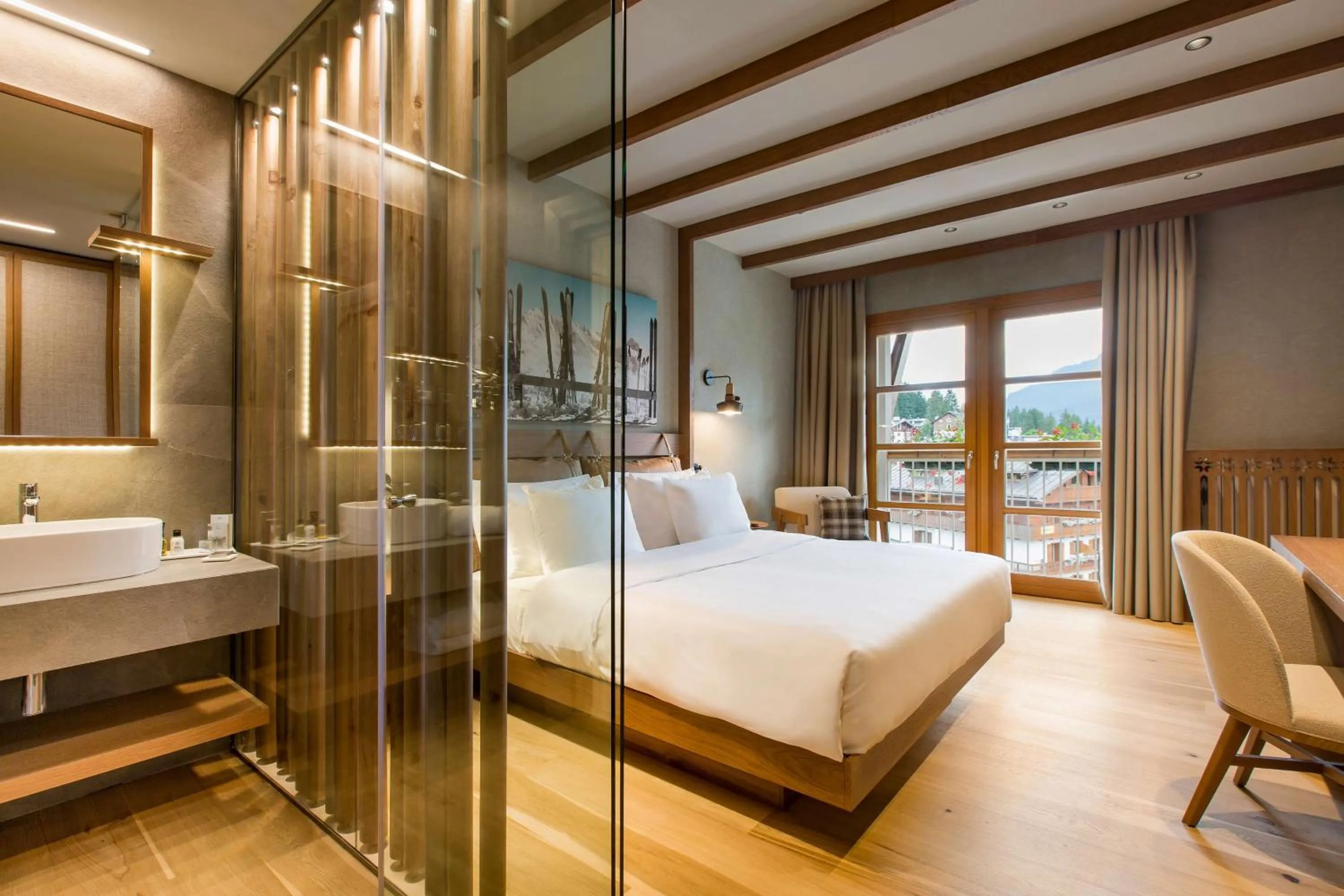 Photo of the whole room, Bed in Grand Hotel Savoia Cortina d'Ampezzo, A Radisson Collection Hotel