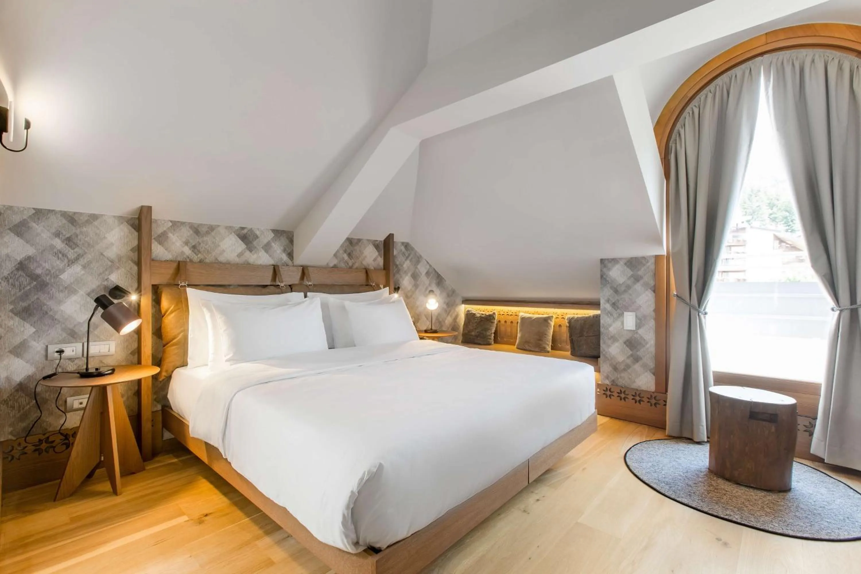 Photo of the whole room, Bed in Grand Hotel Savoia Cortina d'Ampezzo, A Radisson Collection Hotel