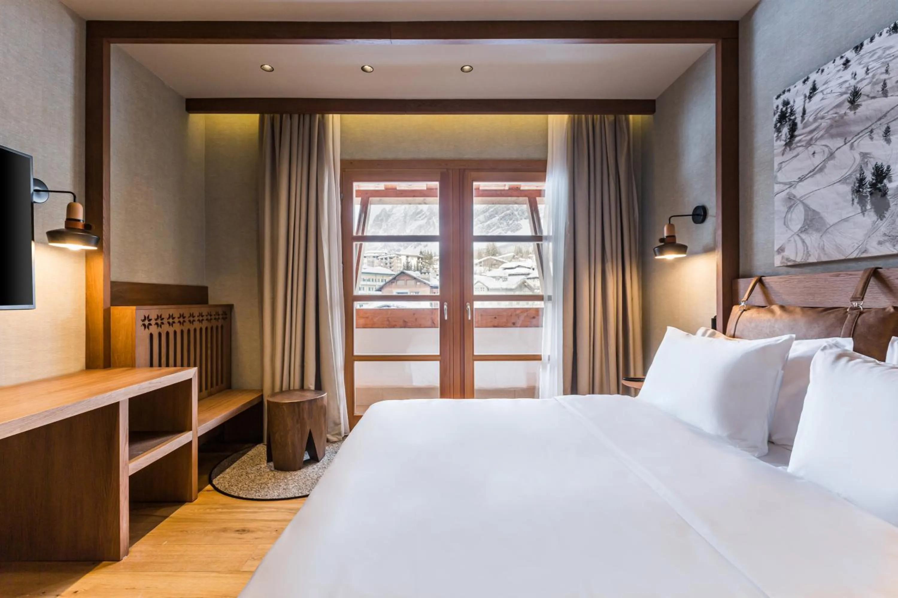 Photo of the whole room, Bed in Grand Hotel Savoia Cortina d'Ampezzo, A Radisson Collection Hotel