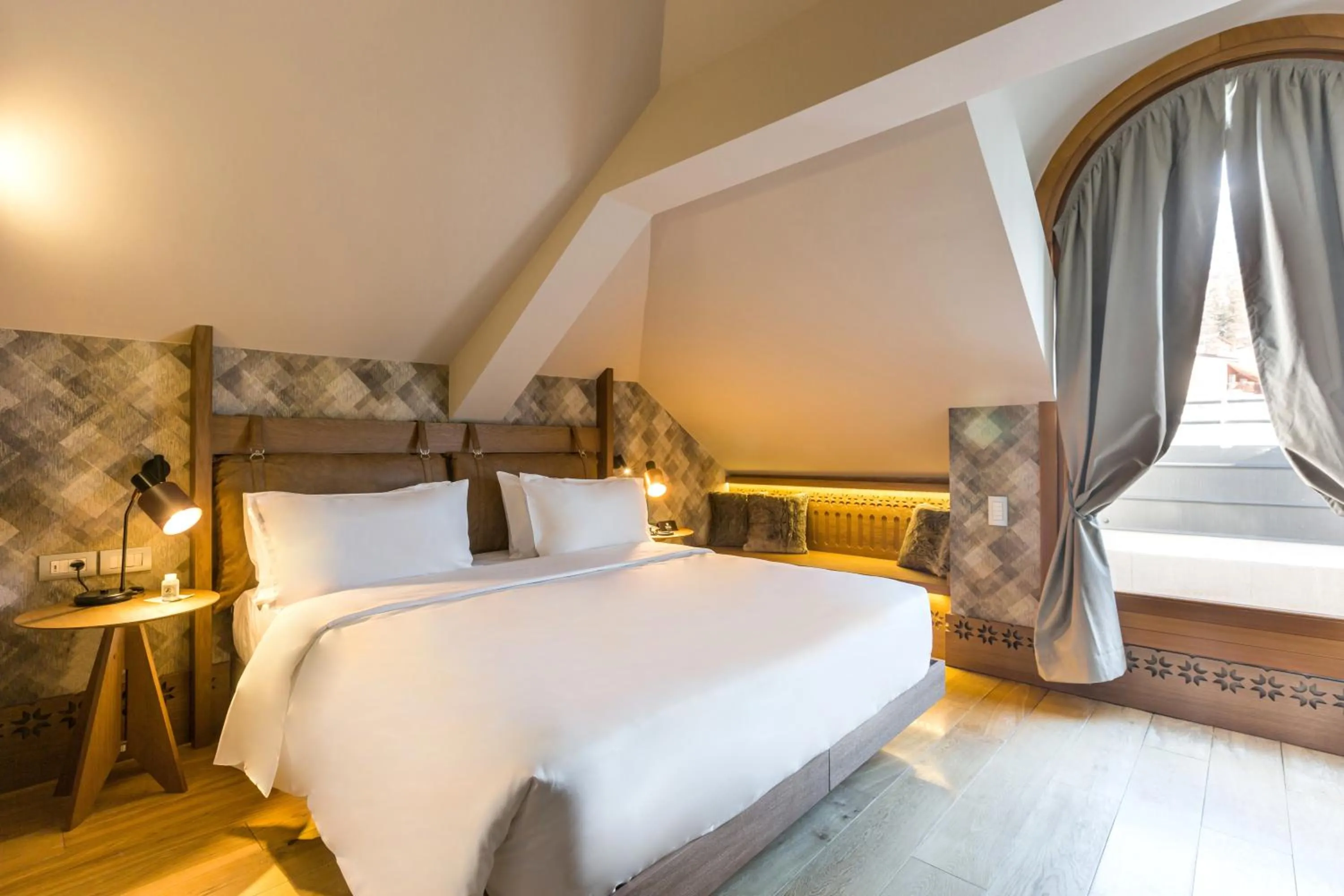 Bedroom, Bed in Grand Hotel Savoia Cortina d'Ampezzo, A Radisson Collection Hotel