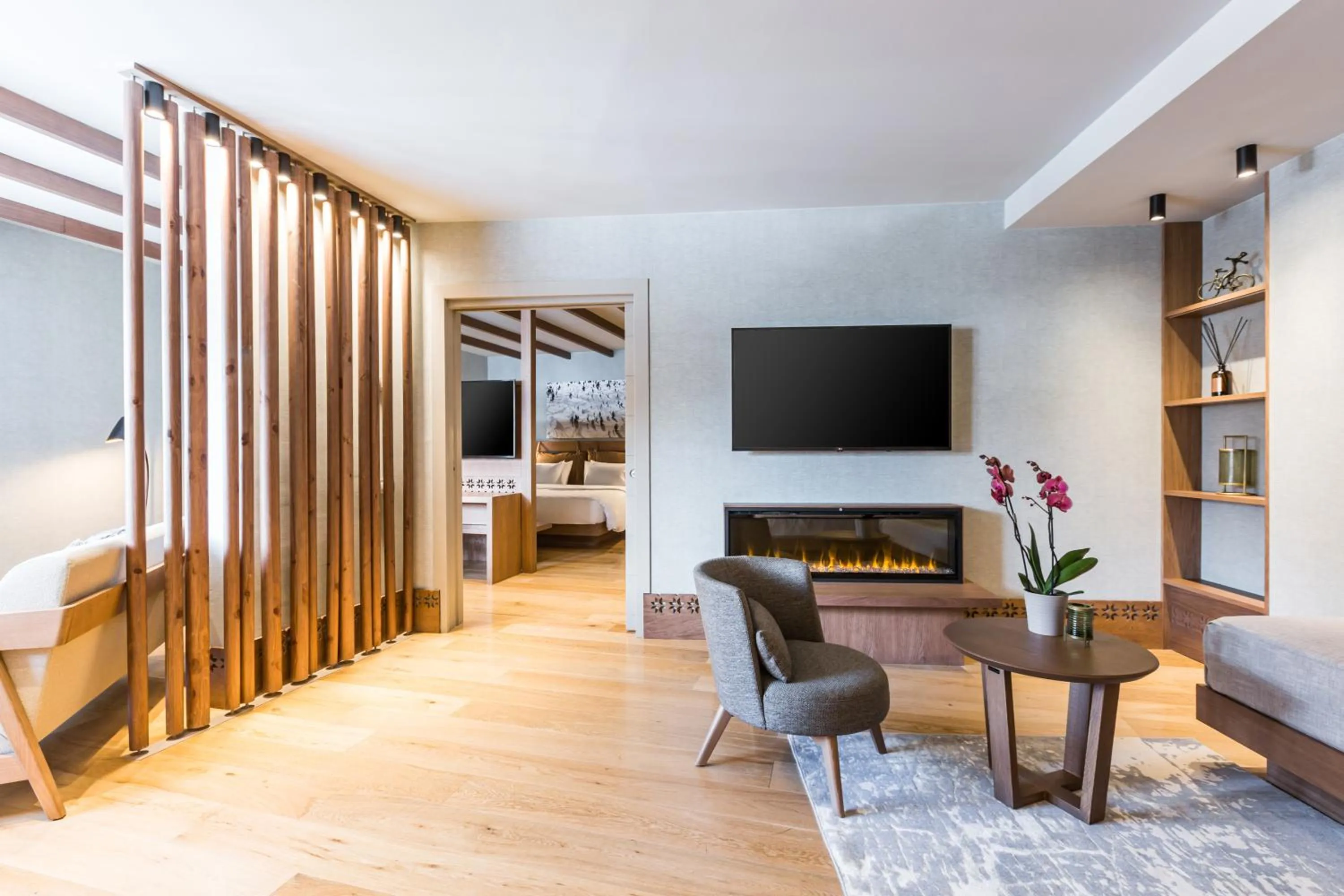 Living room, Bed in Grand Hotel Savoia Cortina d'Ampezzo, A Radisson Collection Hotel