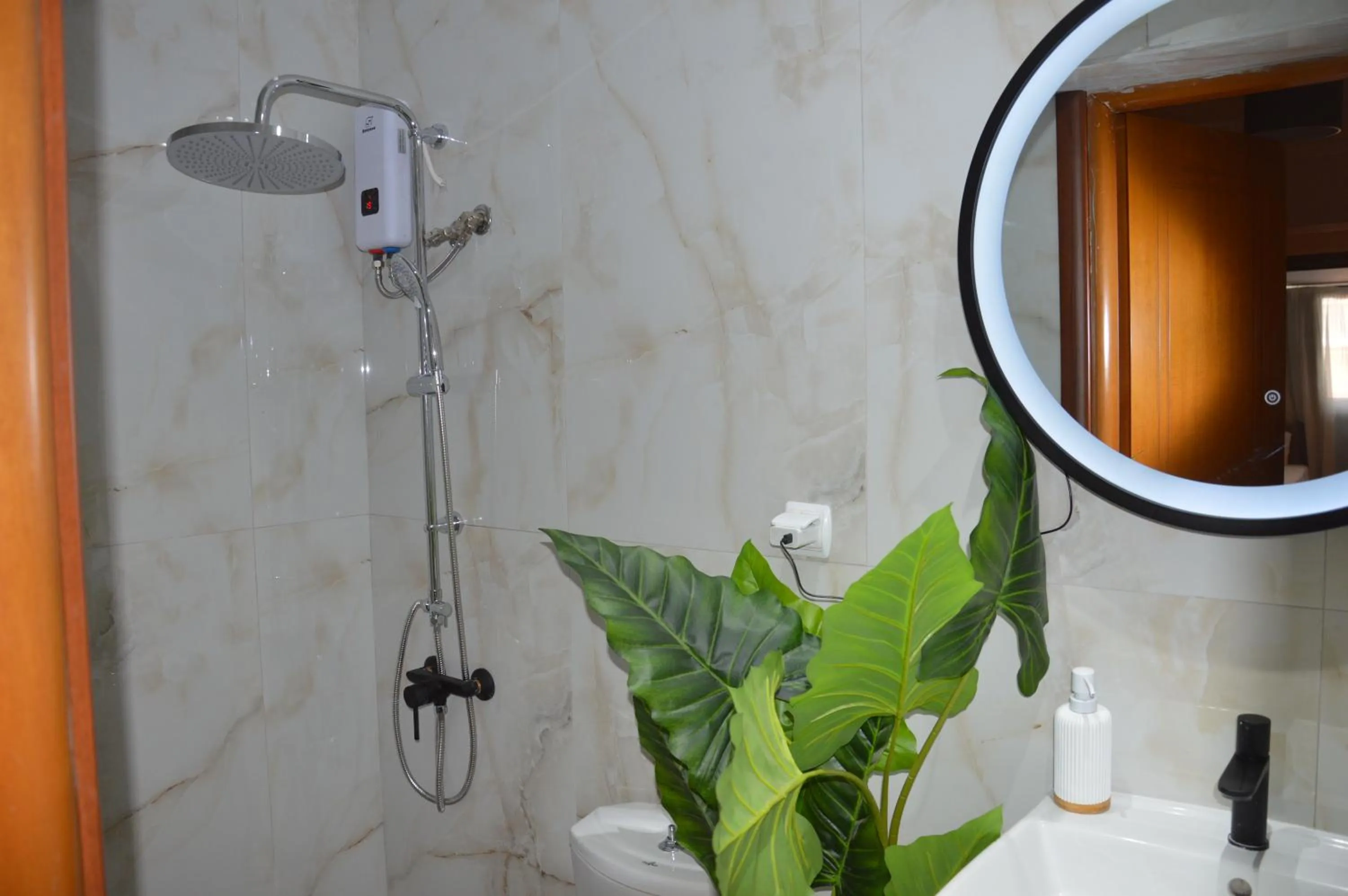 Shower in Aqua Mare Sea Side Rooms