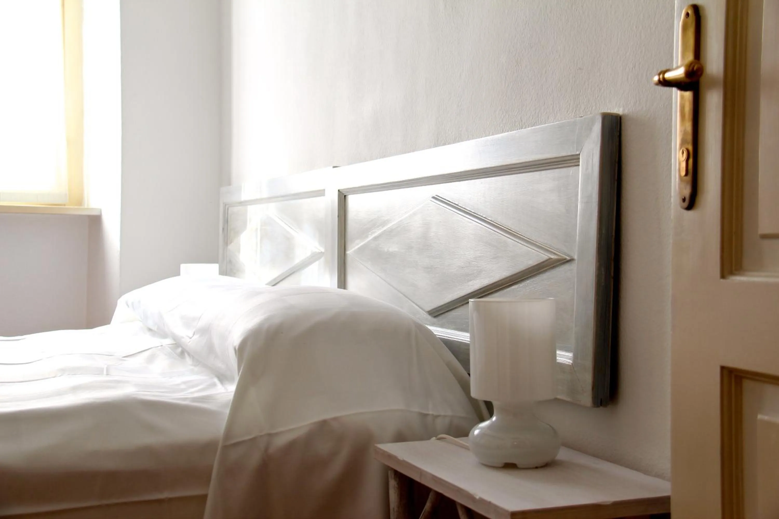 Decorative detail, Bed in Albergo Bologna