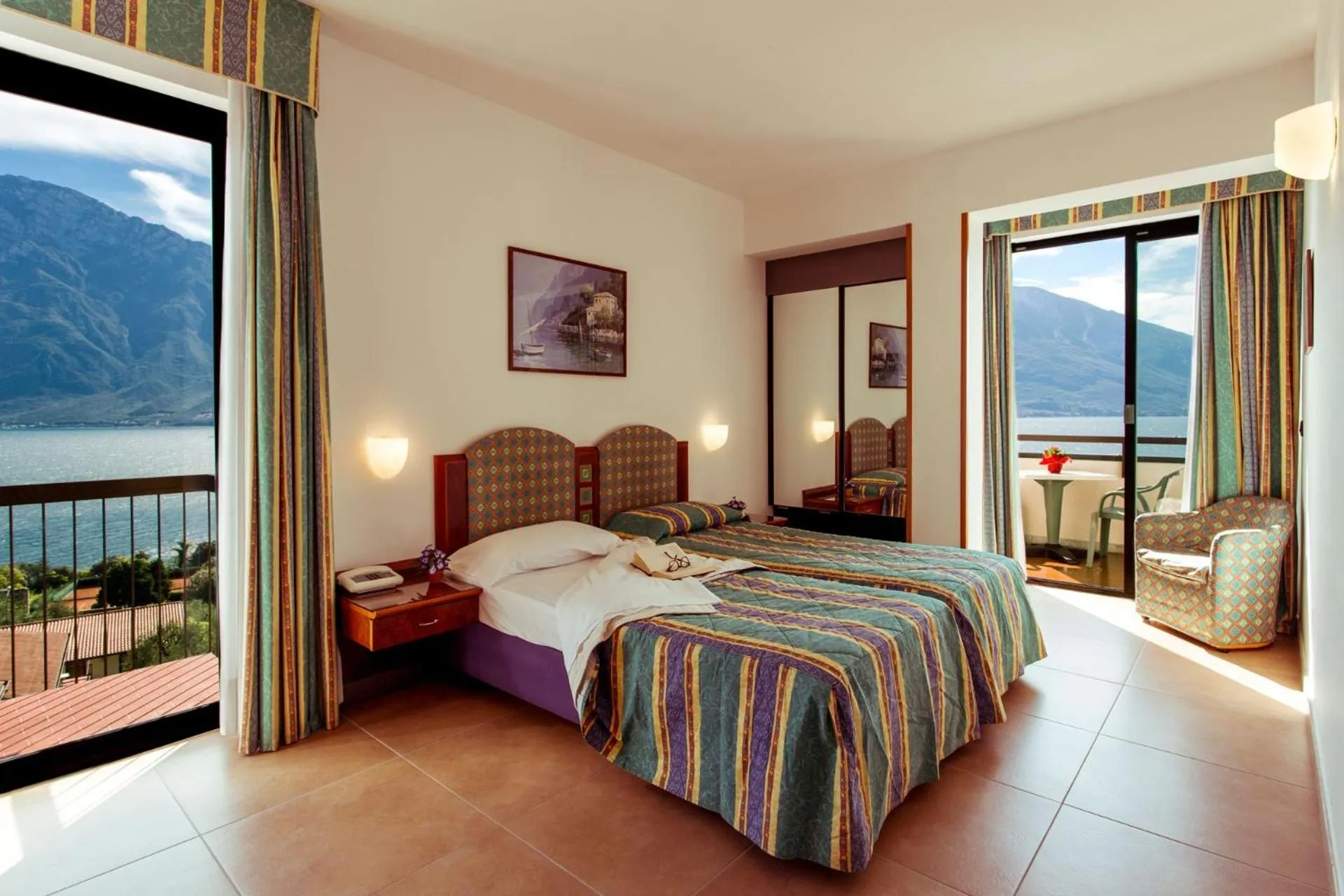 View (from property/room), Bed in Hotel Ilma Lake Garda Resort