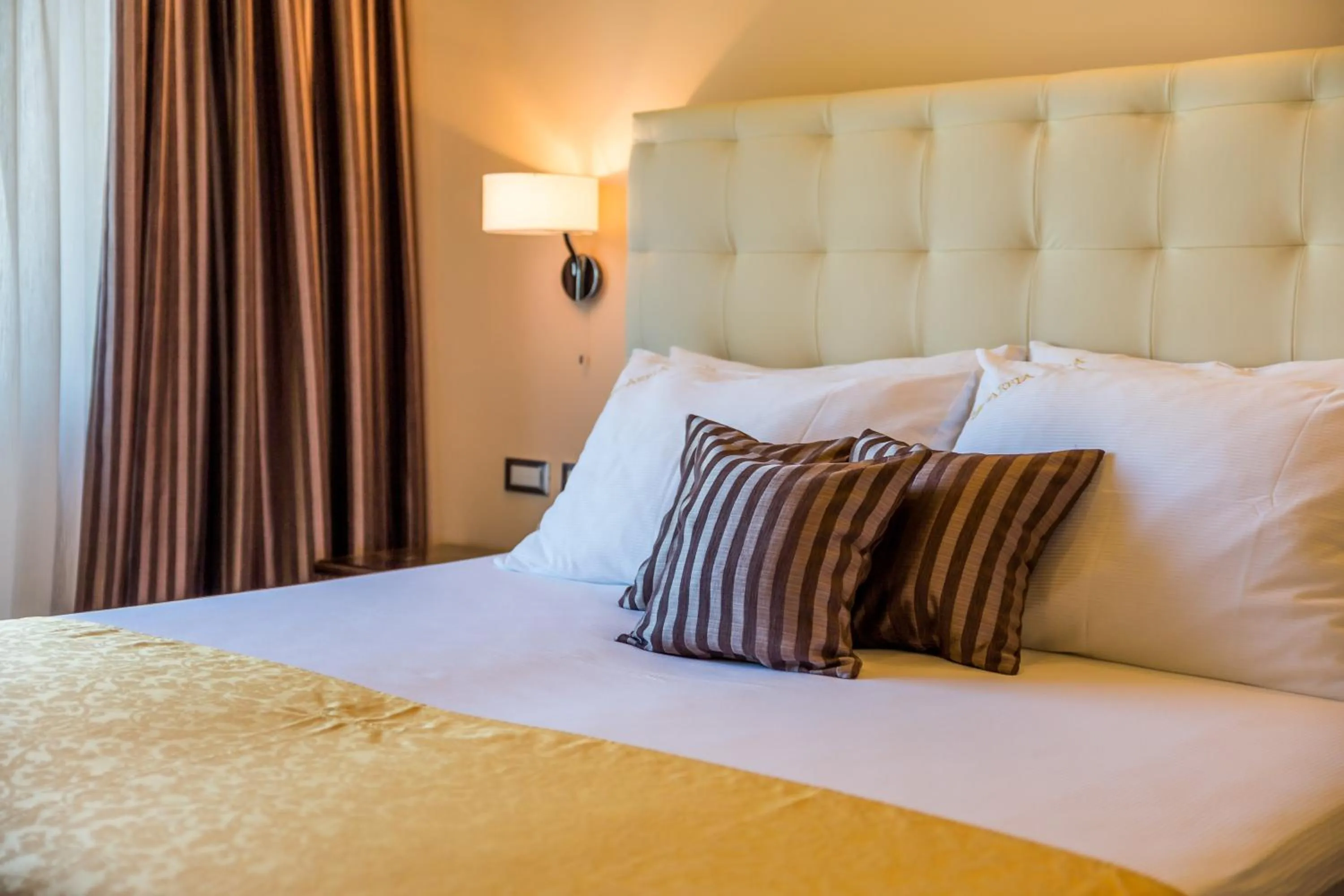 Bed in Villas Arbia - Margita Deluxe Beach Hotel