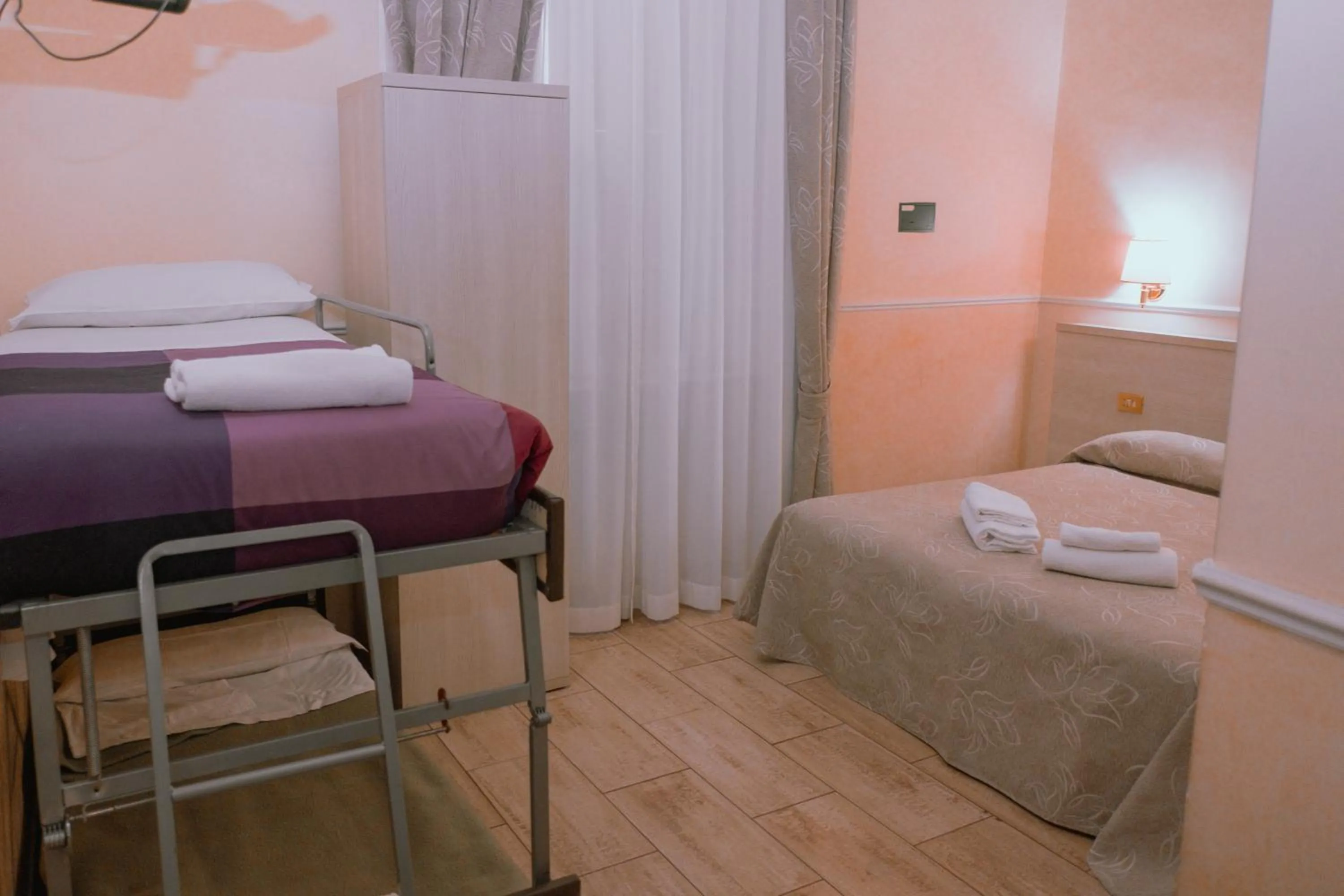 Bed in Hotel Aristotele