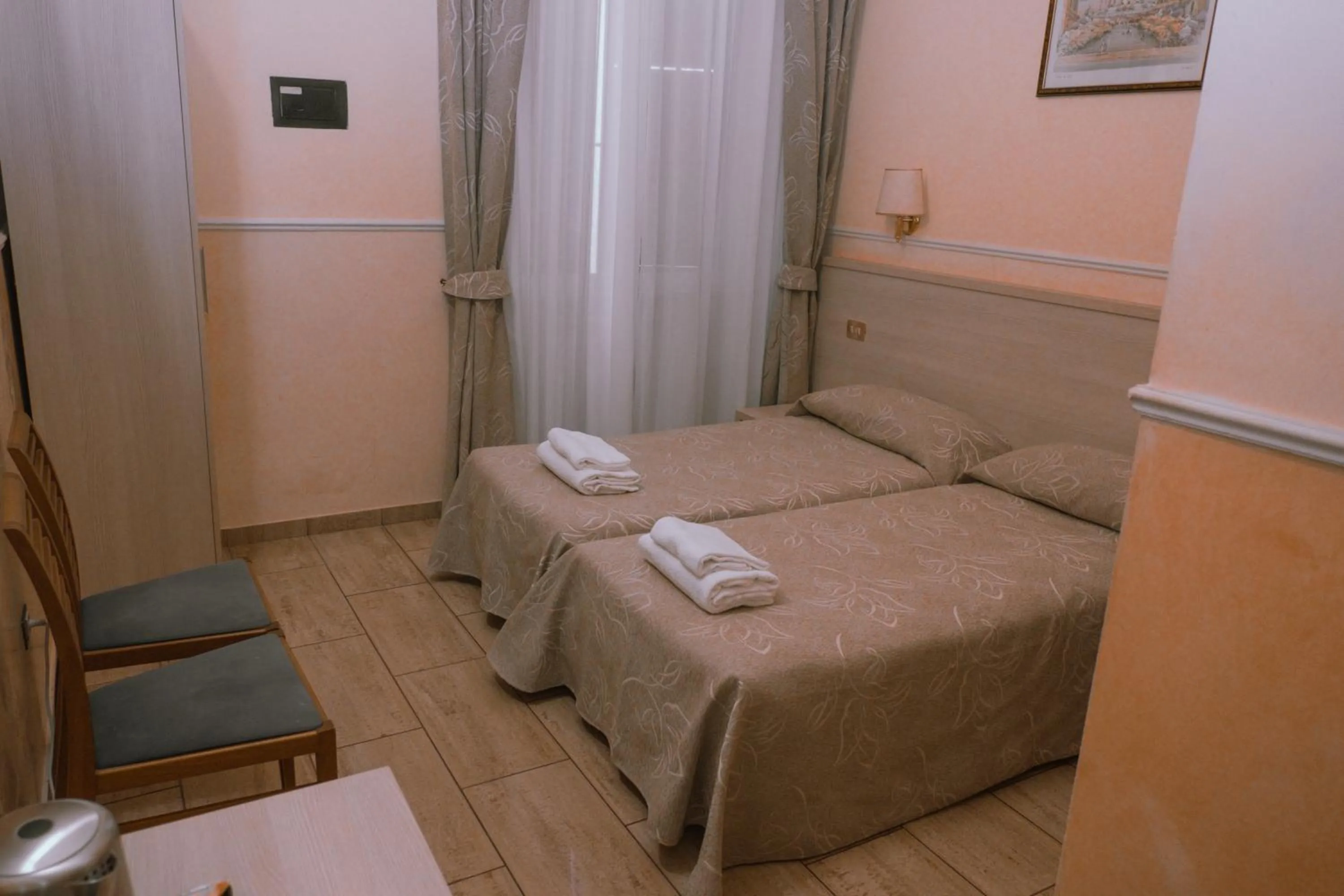 Bed in Hotel Aristotele