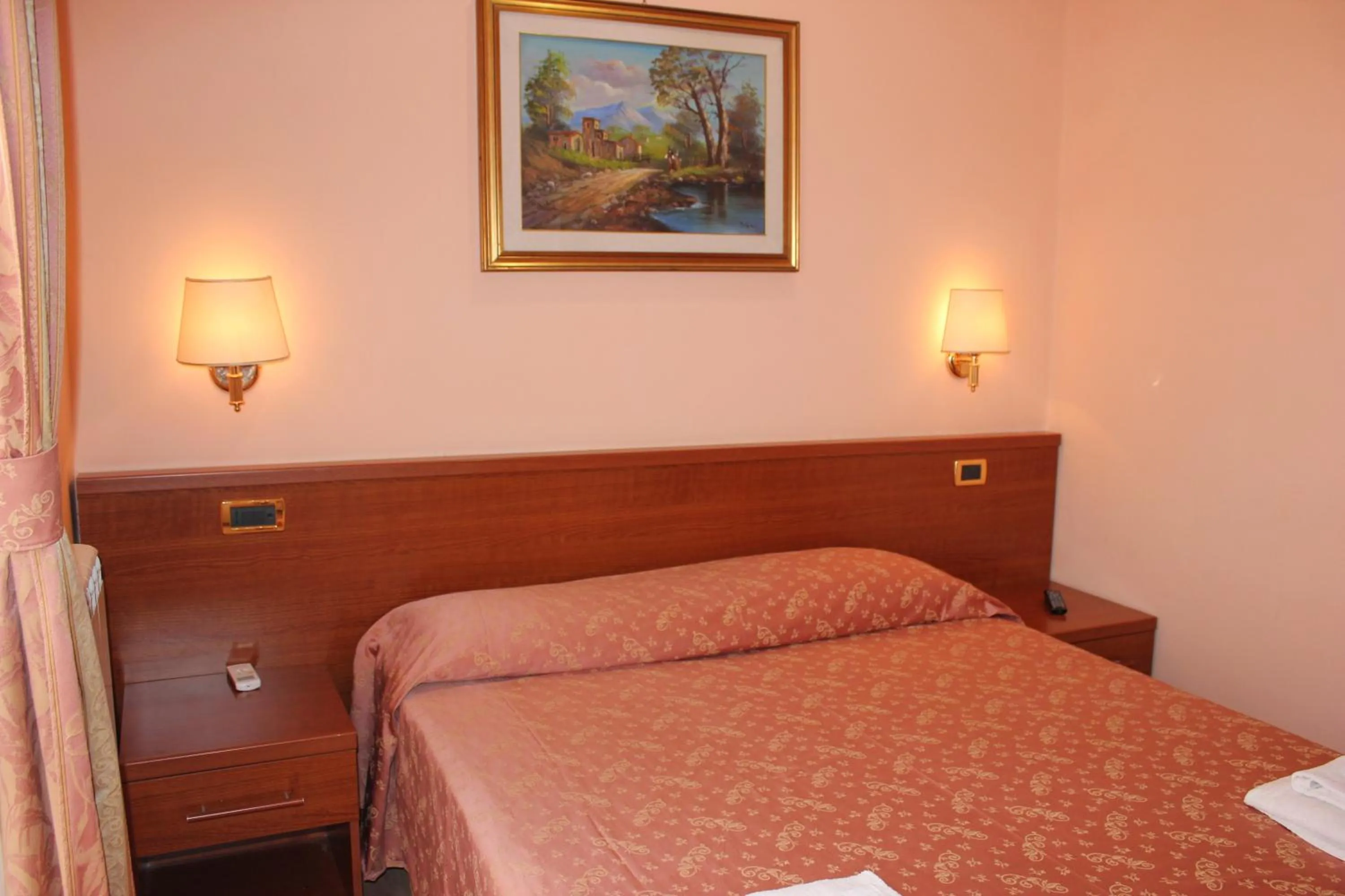 Bed in Hotel Aristotele