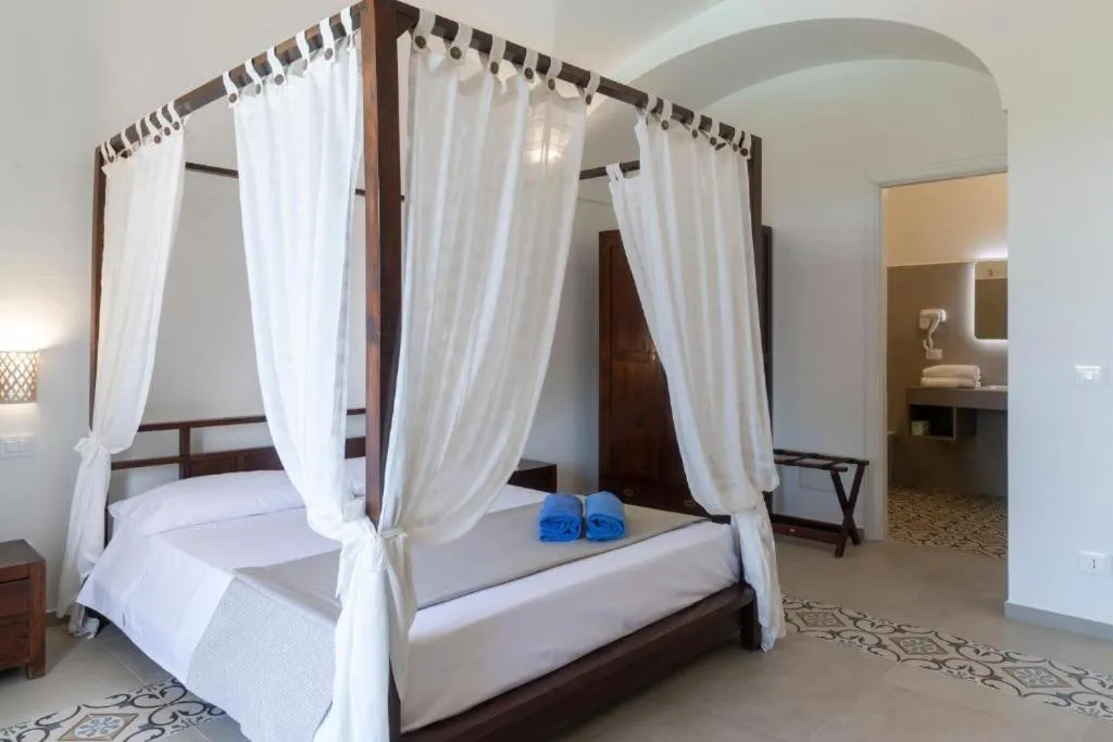 Bed in Hotel Villa Cedrino