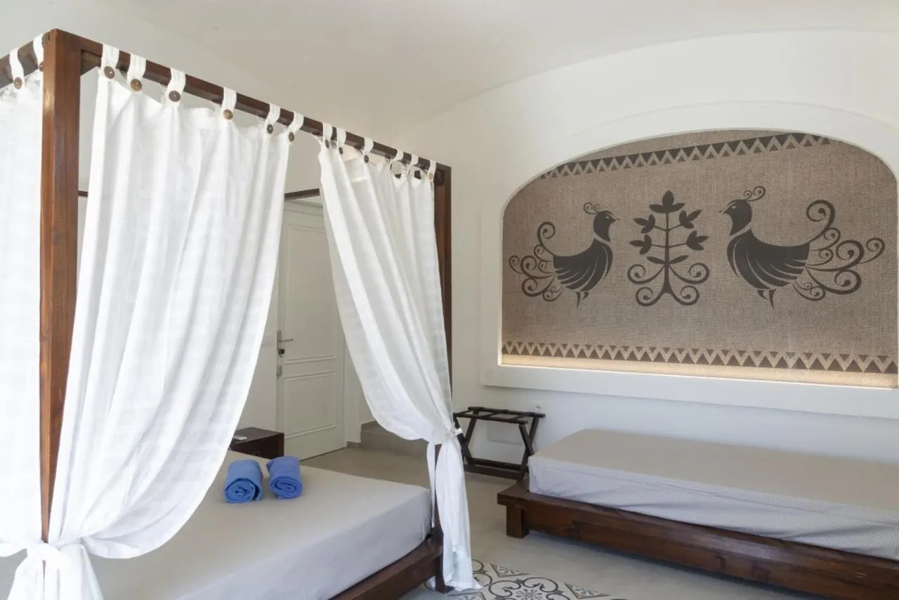 Bed in Hotel Villa Cedrino