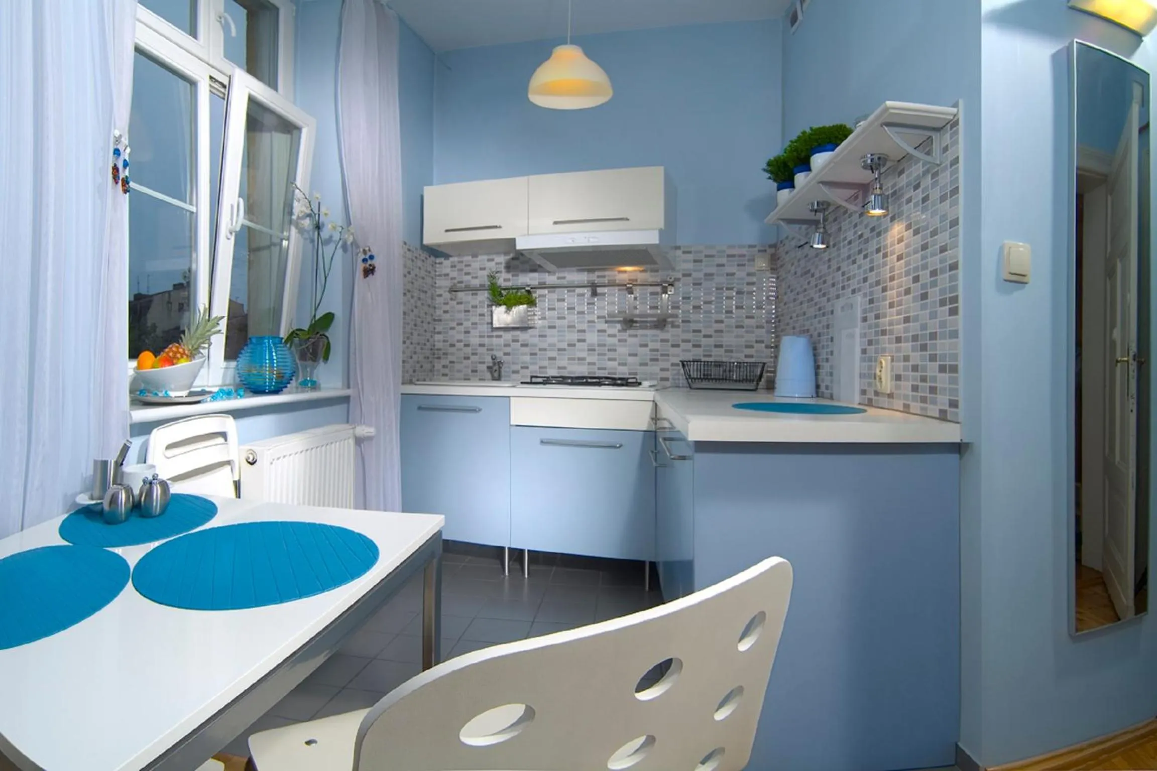 Kitchen or kitchenette in Apartamenty Pomarańczarnia