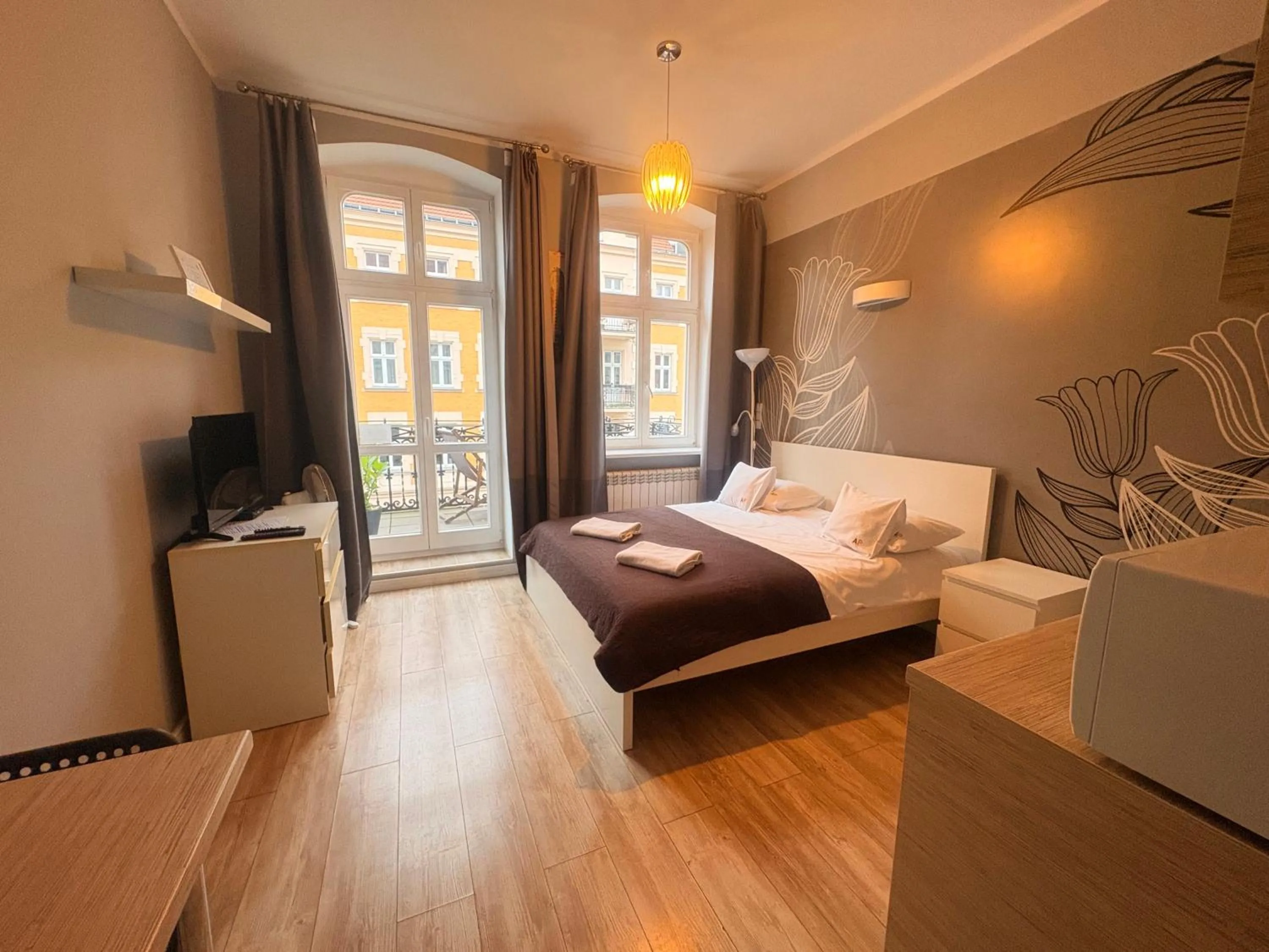 Bed in Apartamenty Pomarańczarnia