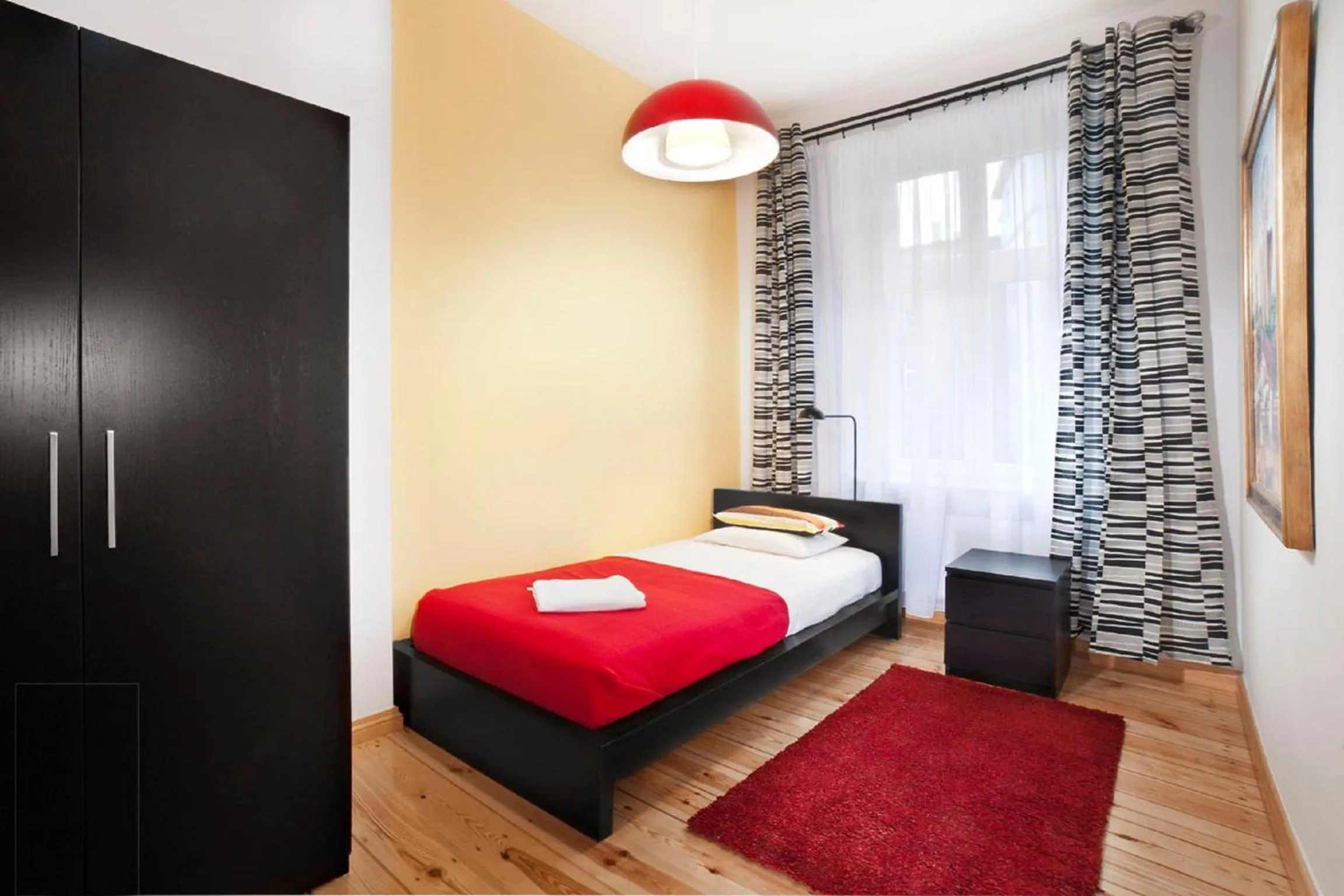 Bed in Apartamenty Pomarańczarnia