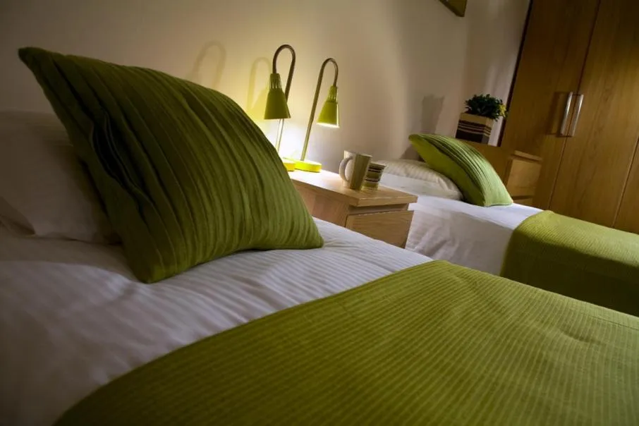 Bed in Apartamenty Pomarańczarnia