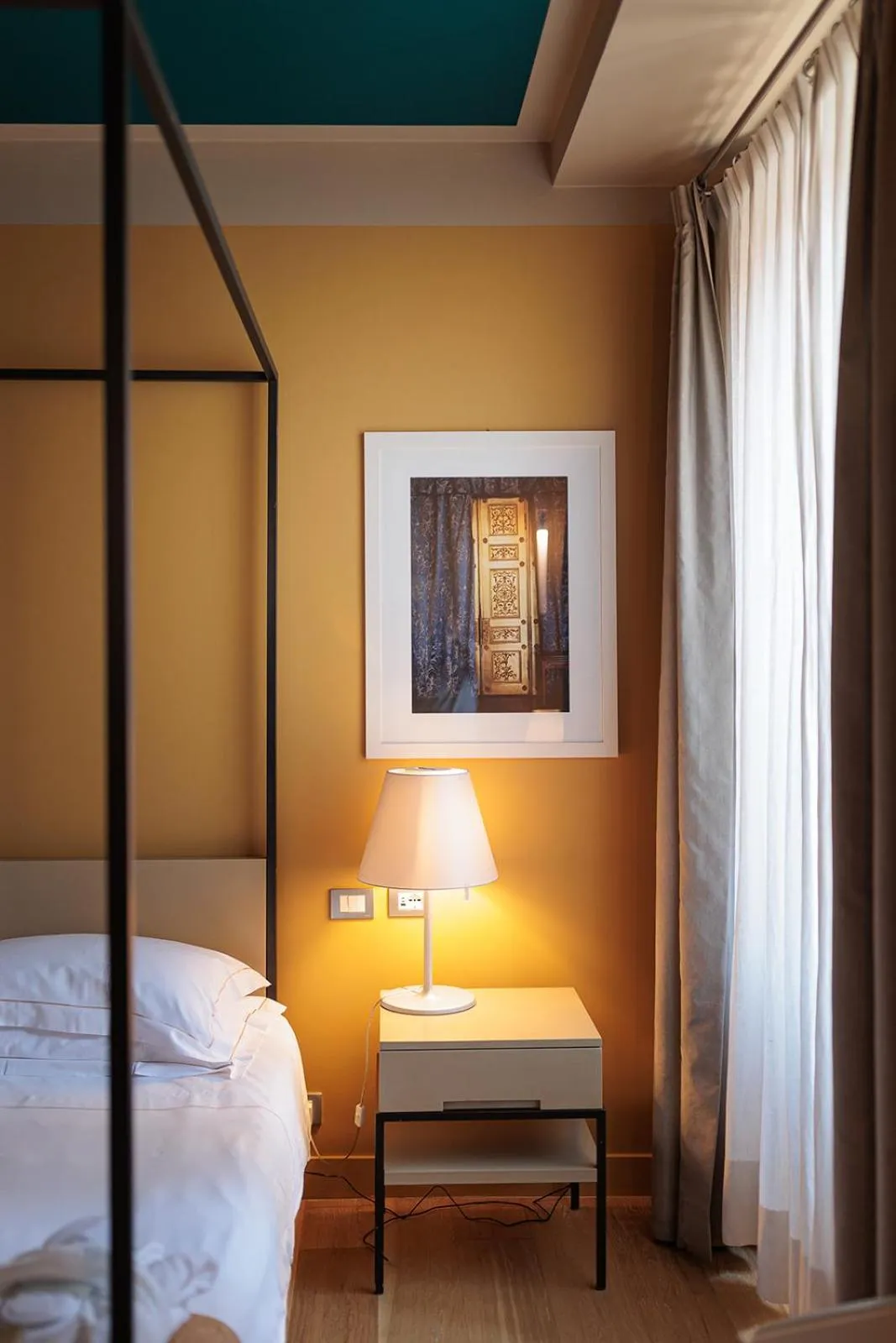 Bed in Escalus Luxury Suites Verona