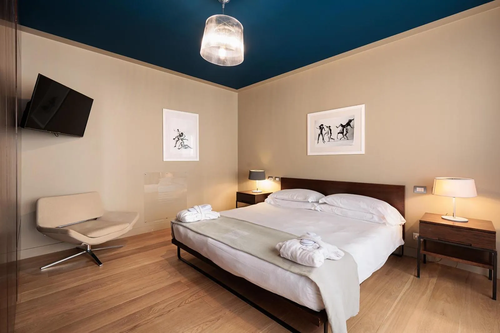 Bed in Escalus Luxury Suites Verona