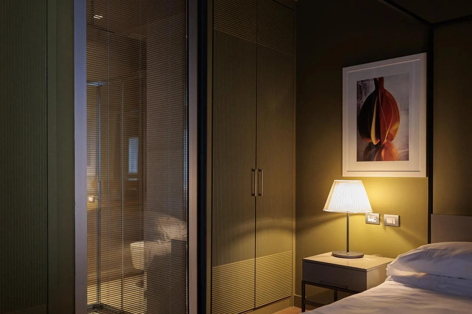 Bed in Escalus Luxury Suites Verona