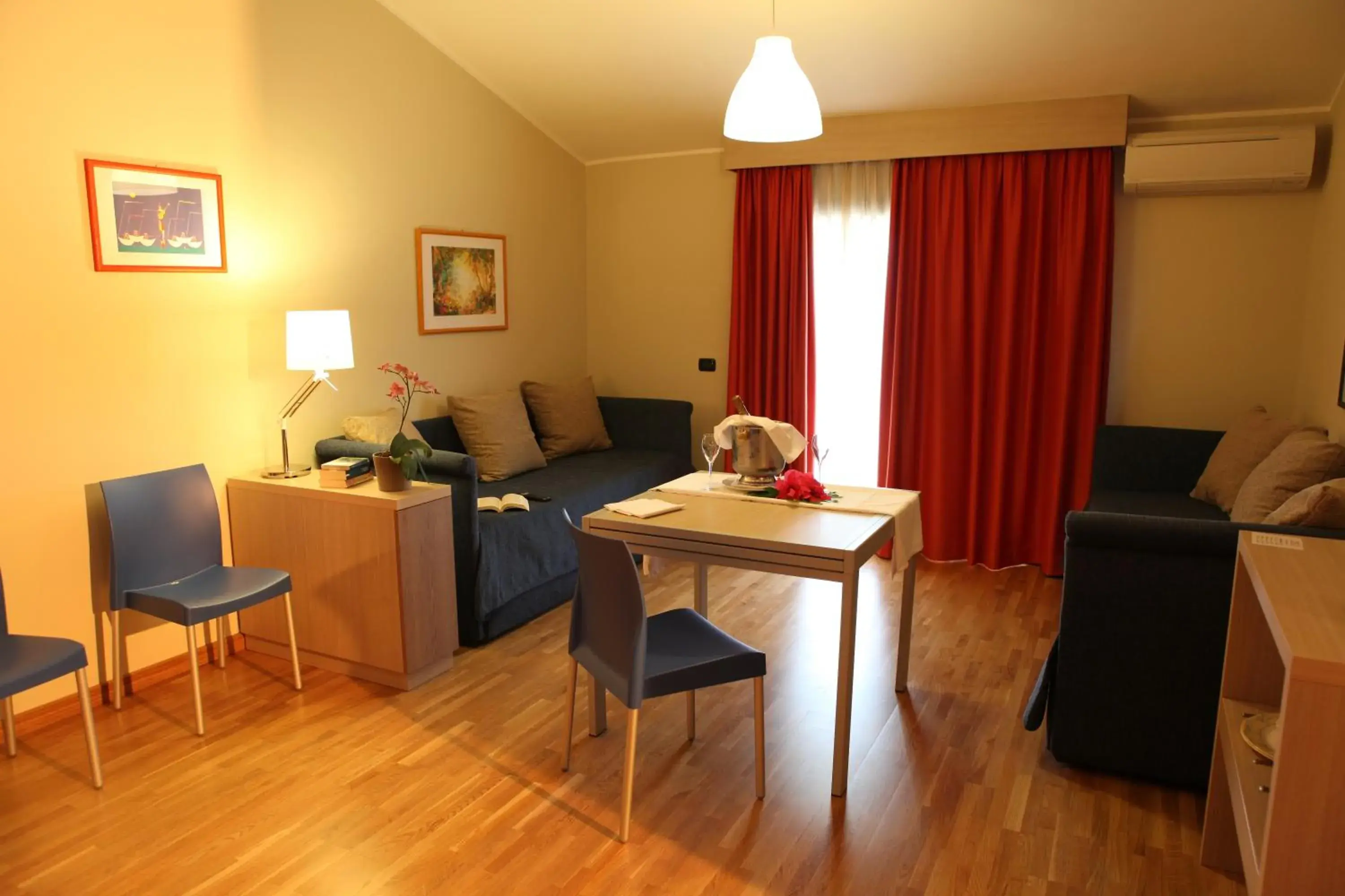 Living room in Heraclea Hotel Residence Living room in Heraclea Hotel Residence