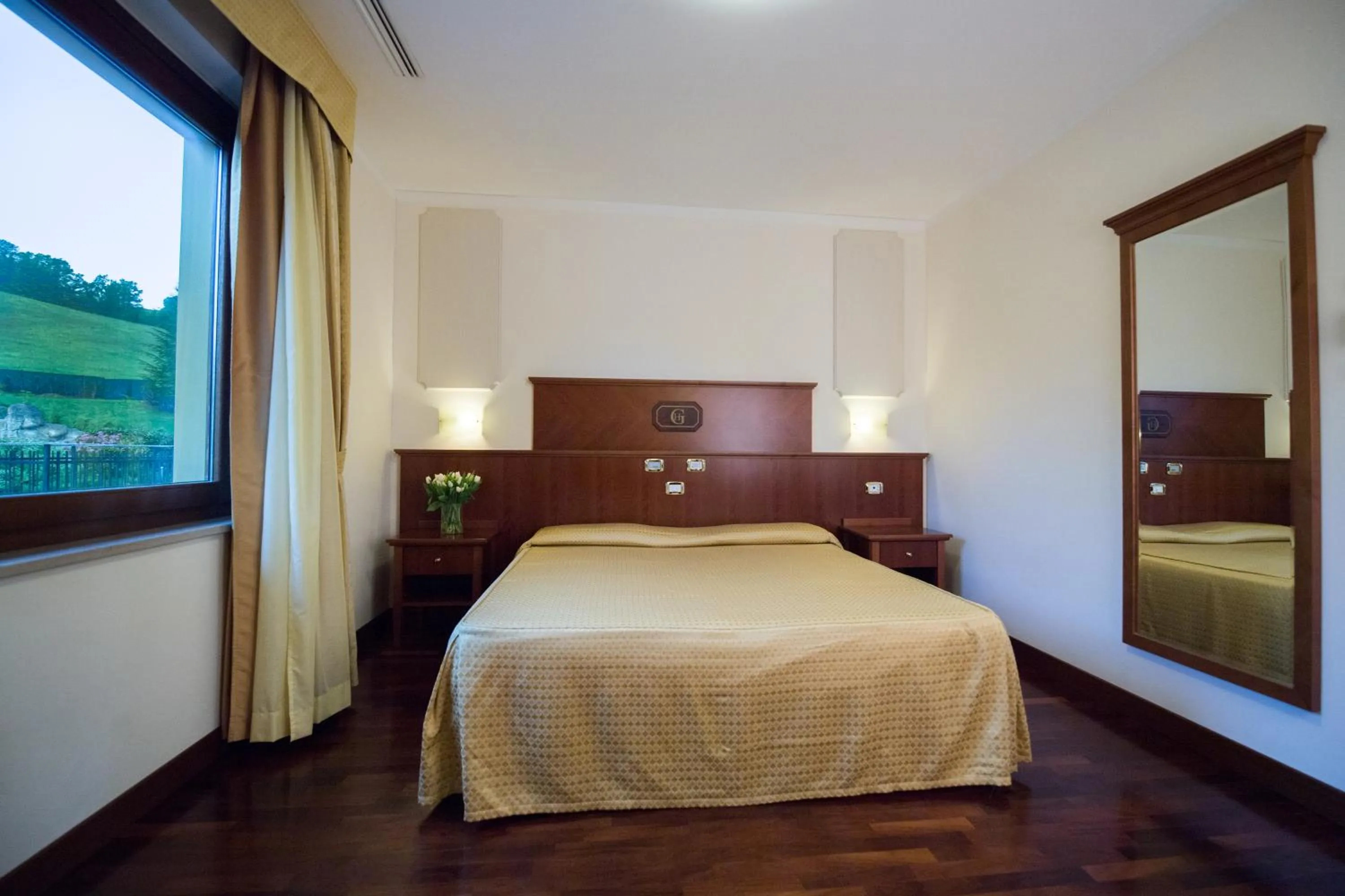 Bed in Hotel Le Grotte