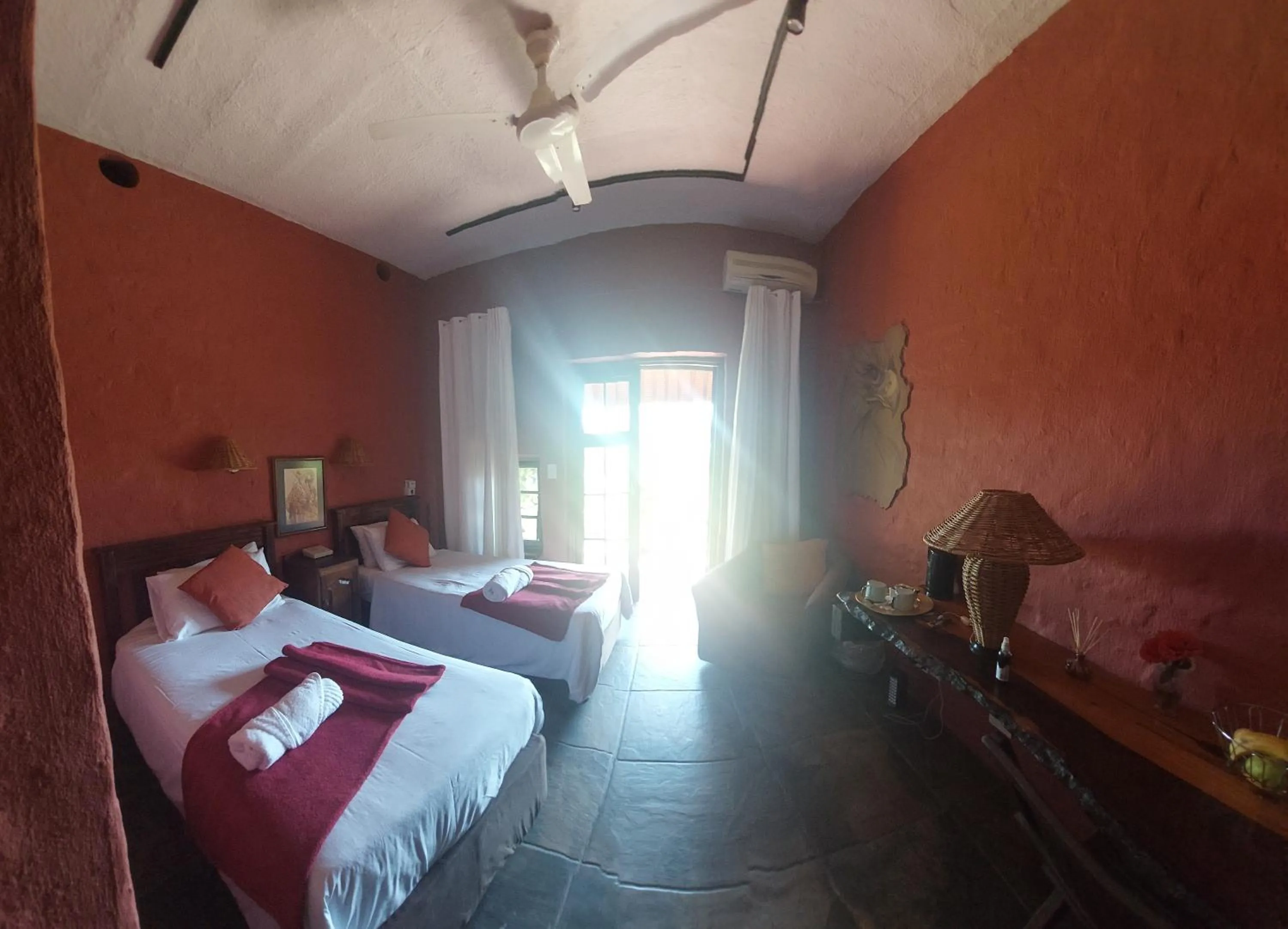 Photo of the whole room, Bed in River House Lodge